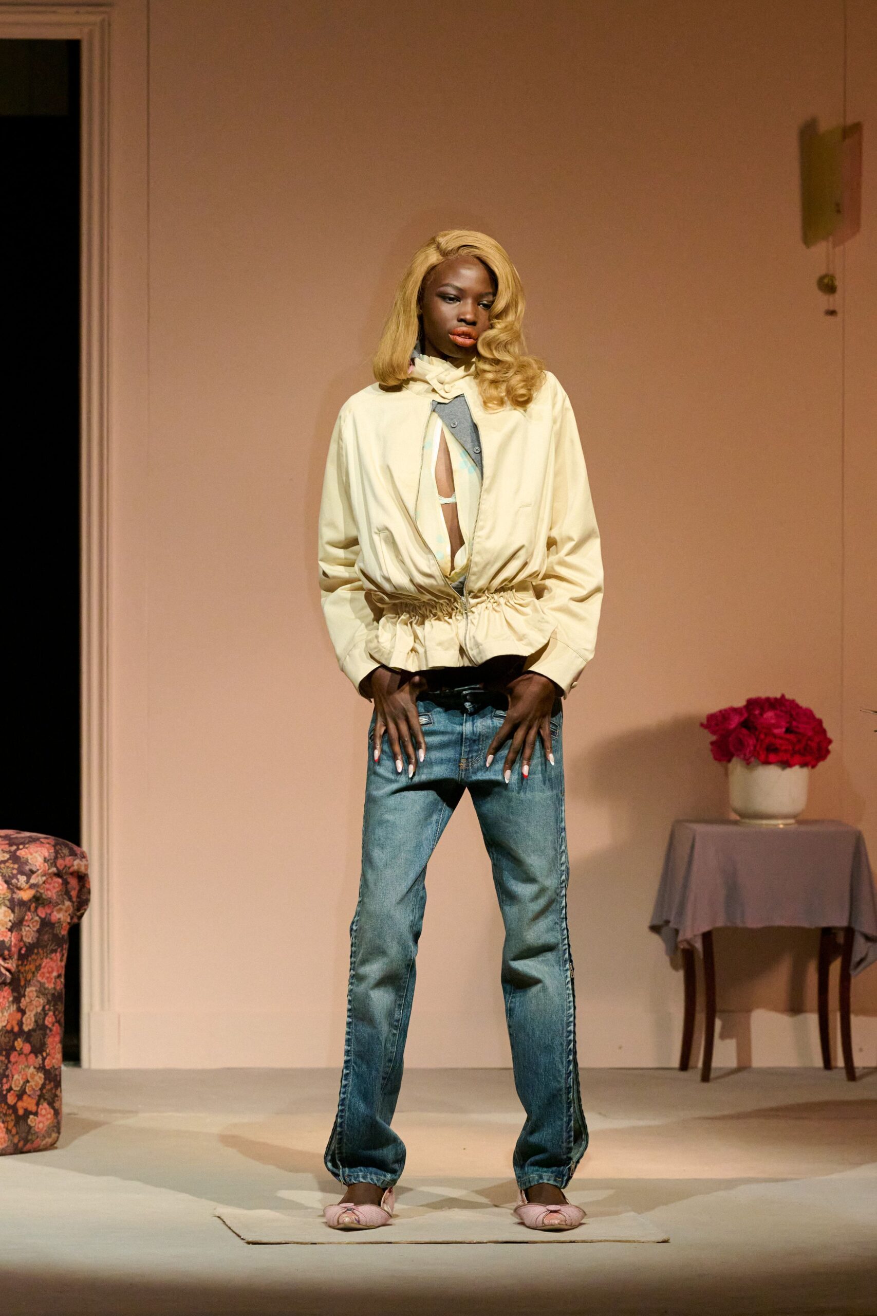 beige jacket blue jeans pink shoes