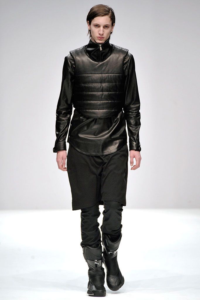 black leather sleeveless high-neck structured panelled shiny vest