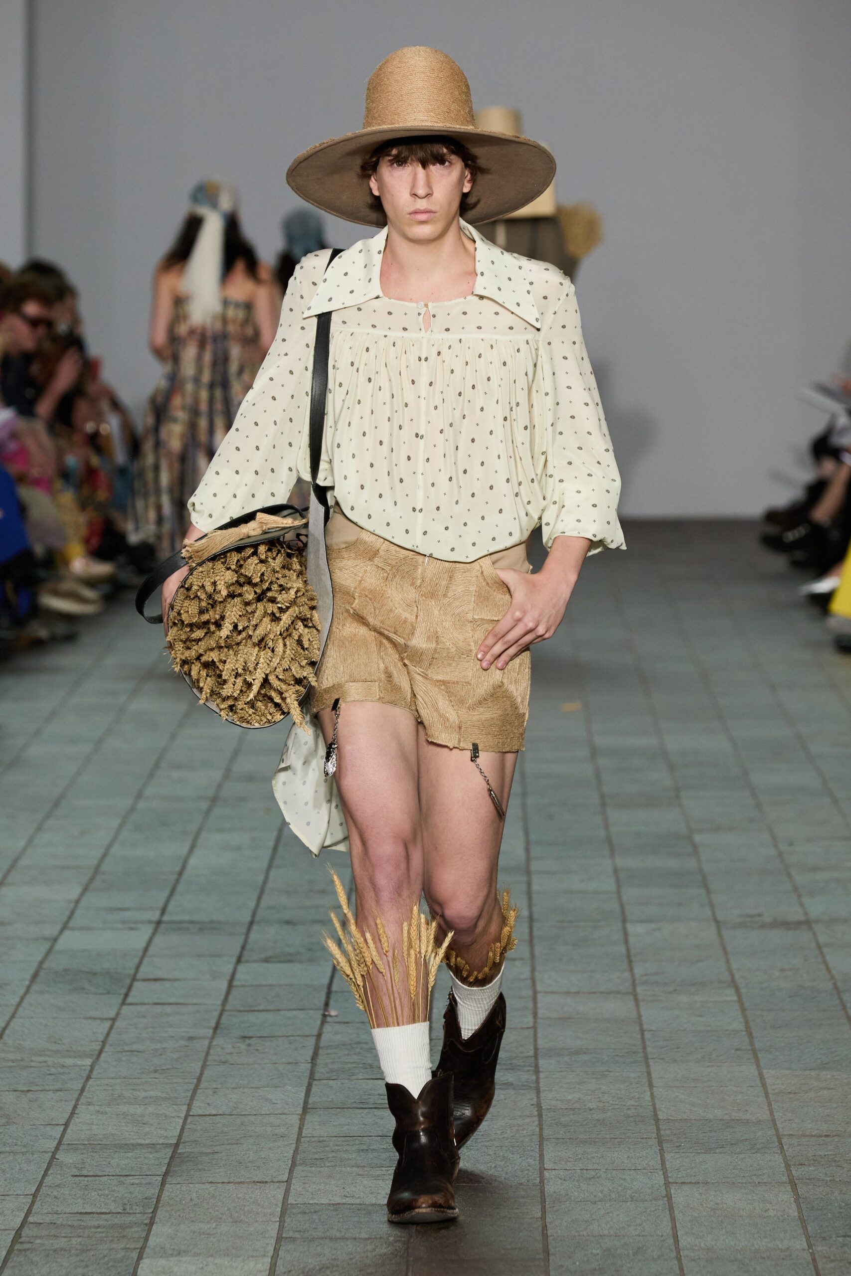 white polka-dot shirt with beige shorts