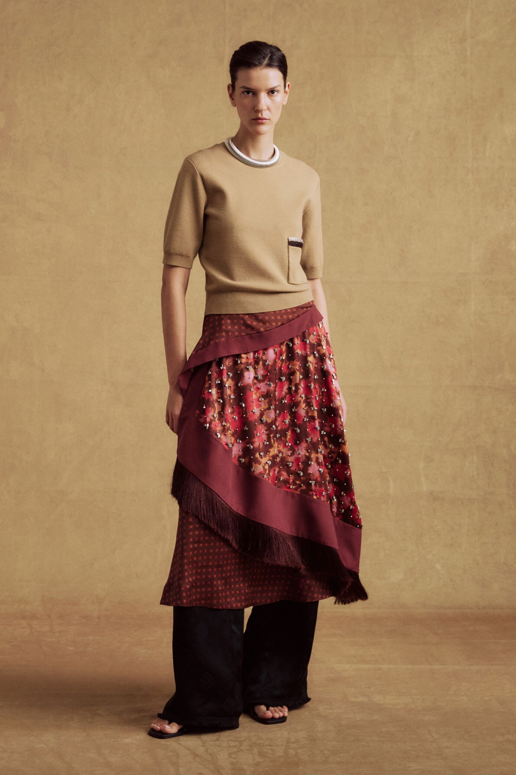 beige fitted top with layered skirt