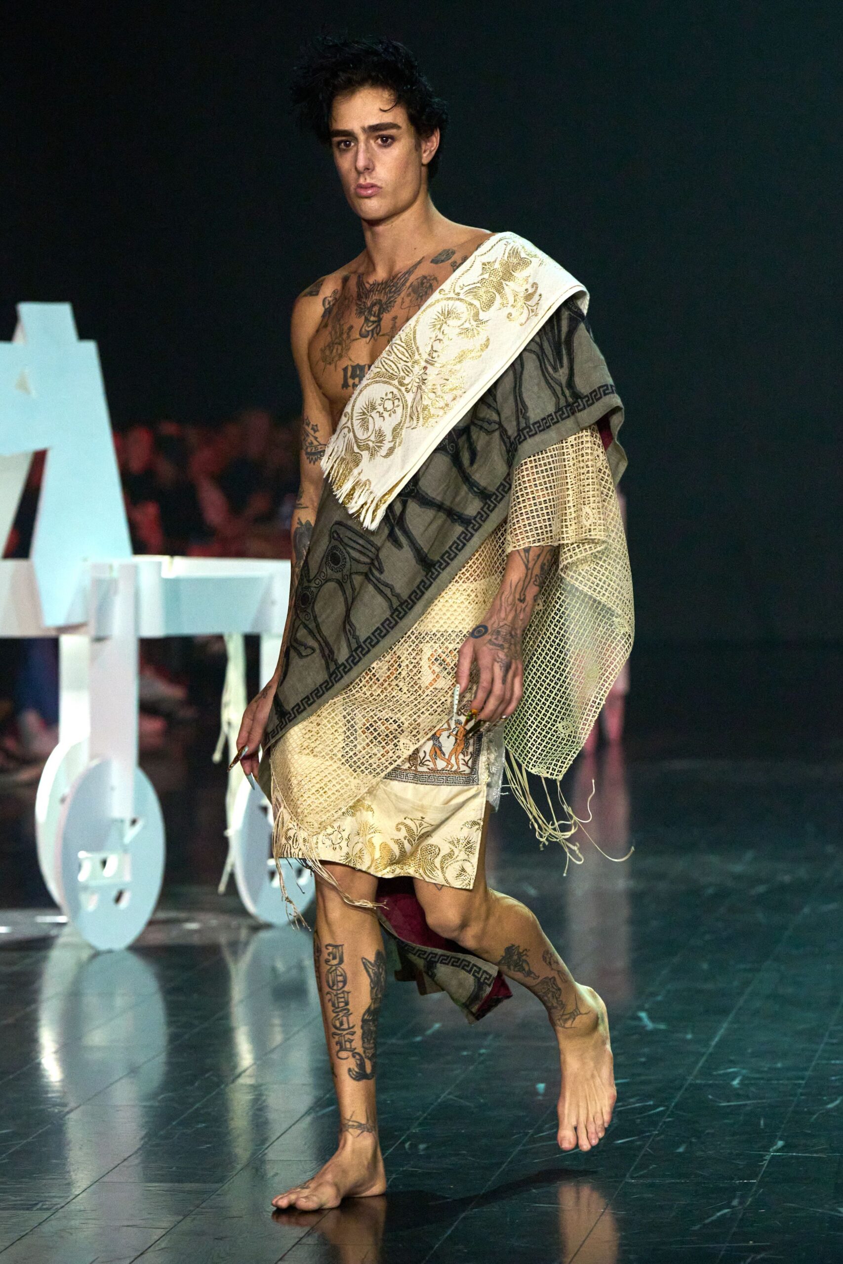 black and beige embroidered cape
