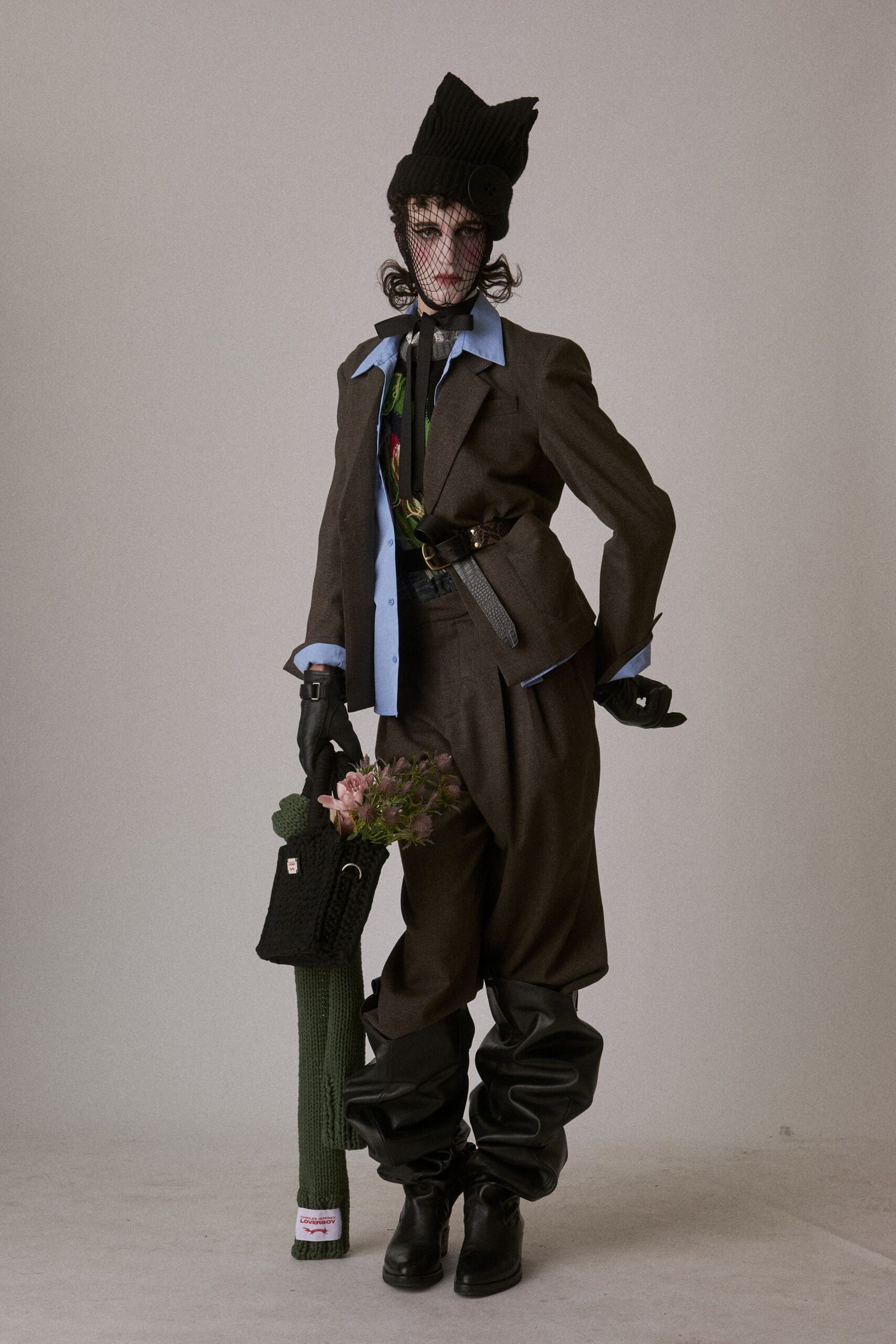 brown wool relaxed suit with blue shirt