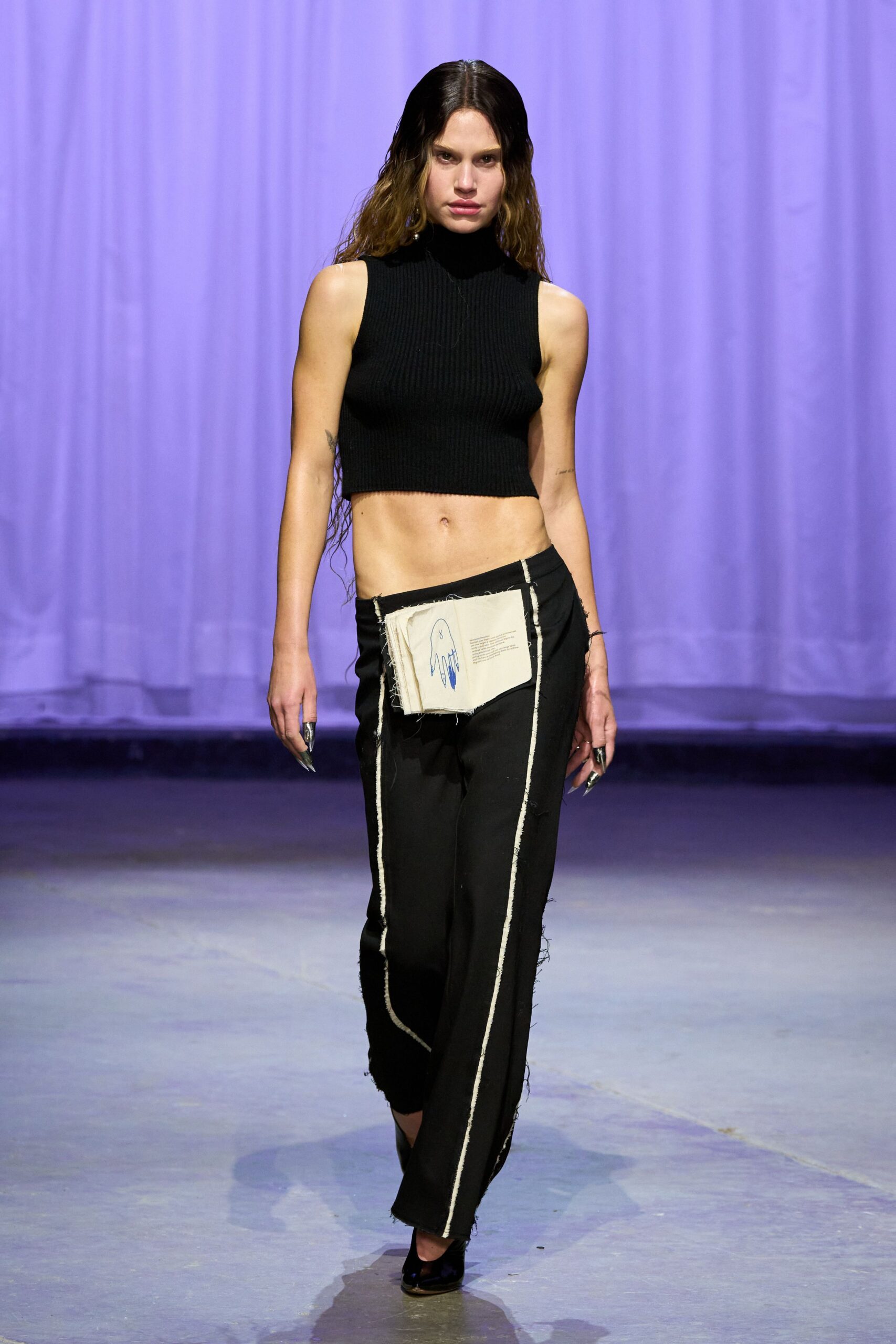 black fitted top and relaxed pants