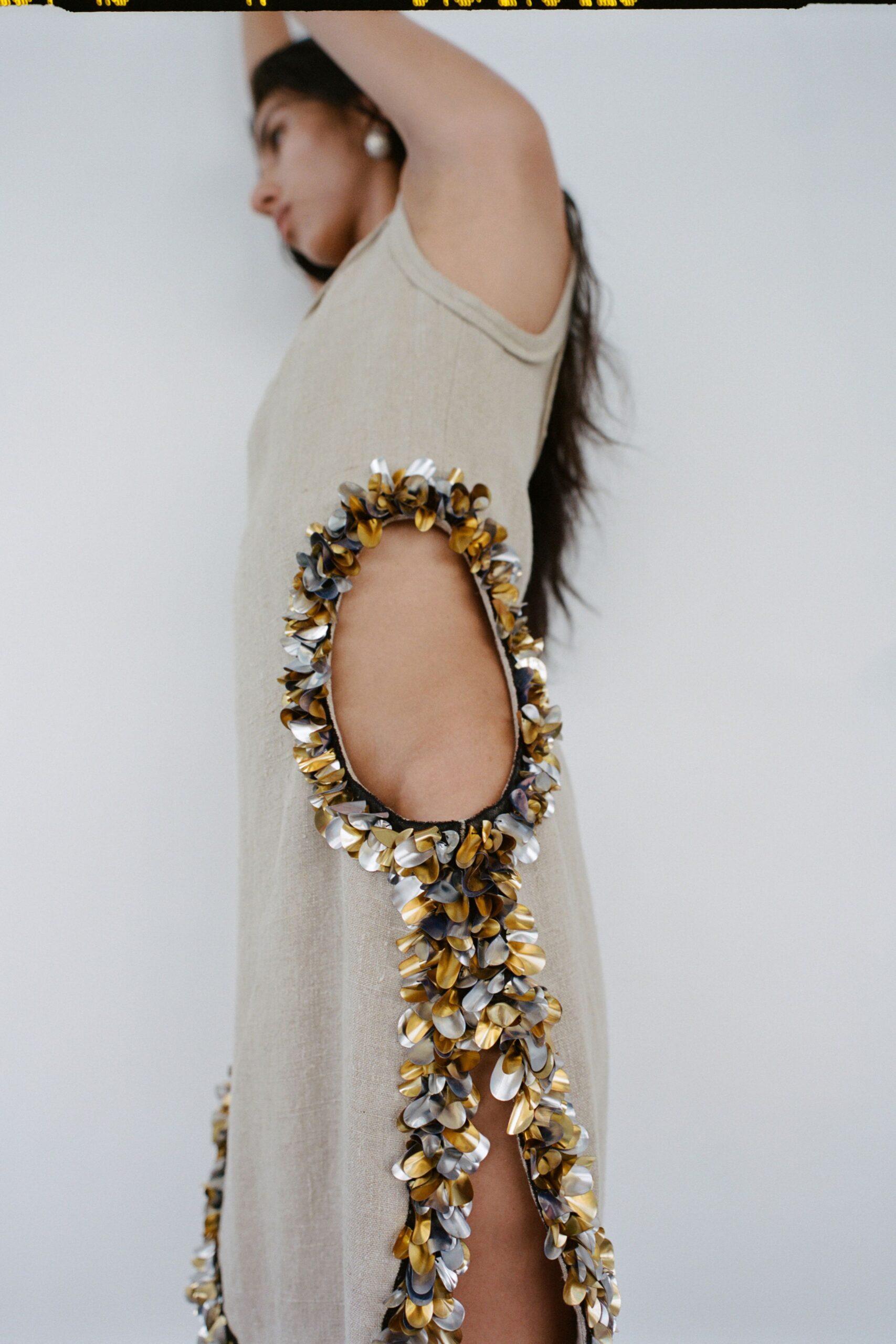 beige embellished sleeveless dress