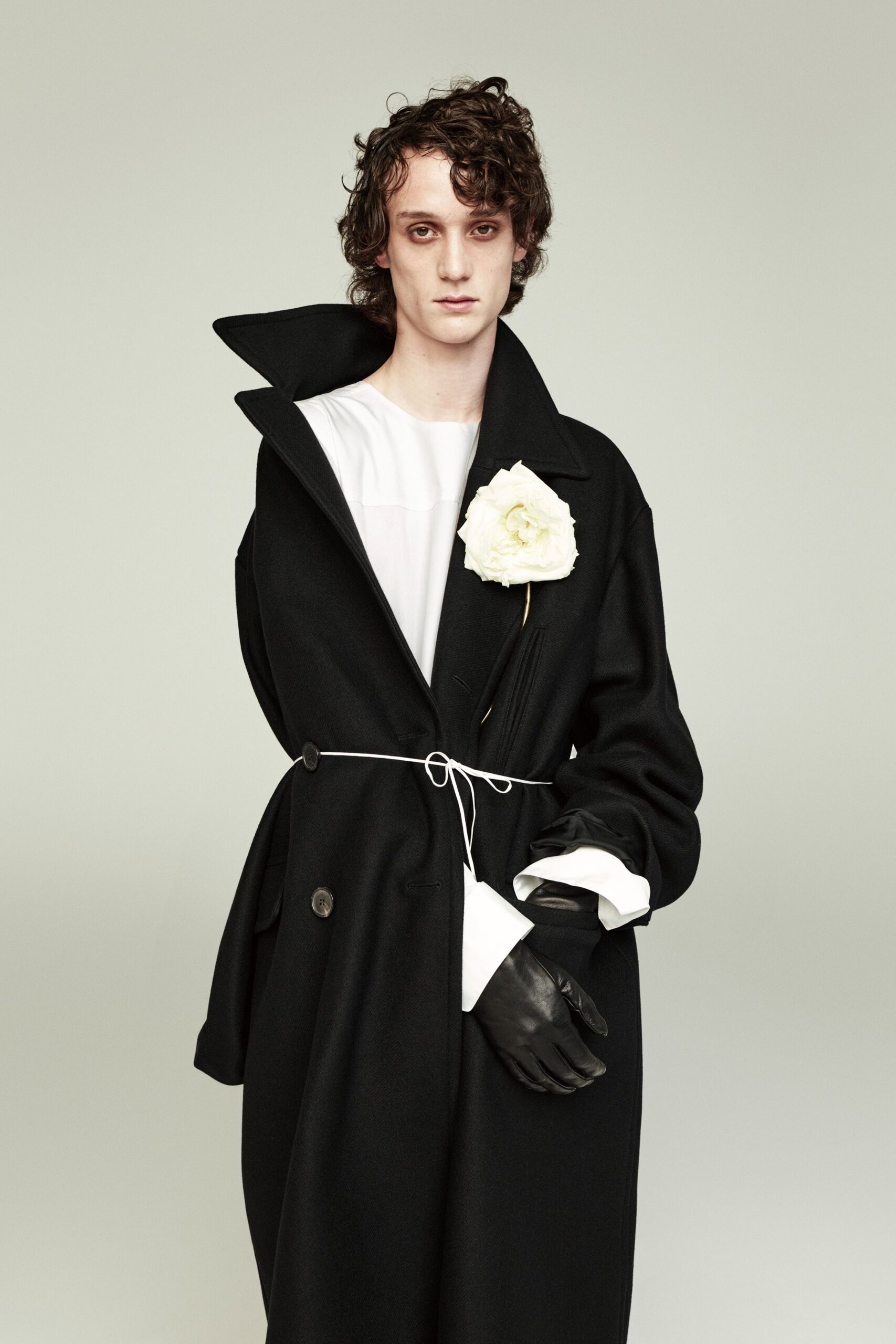 black wool coat with white top