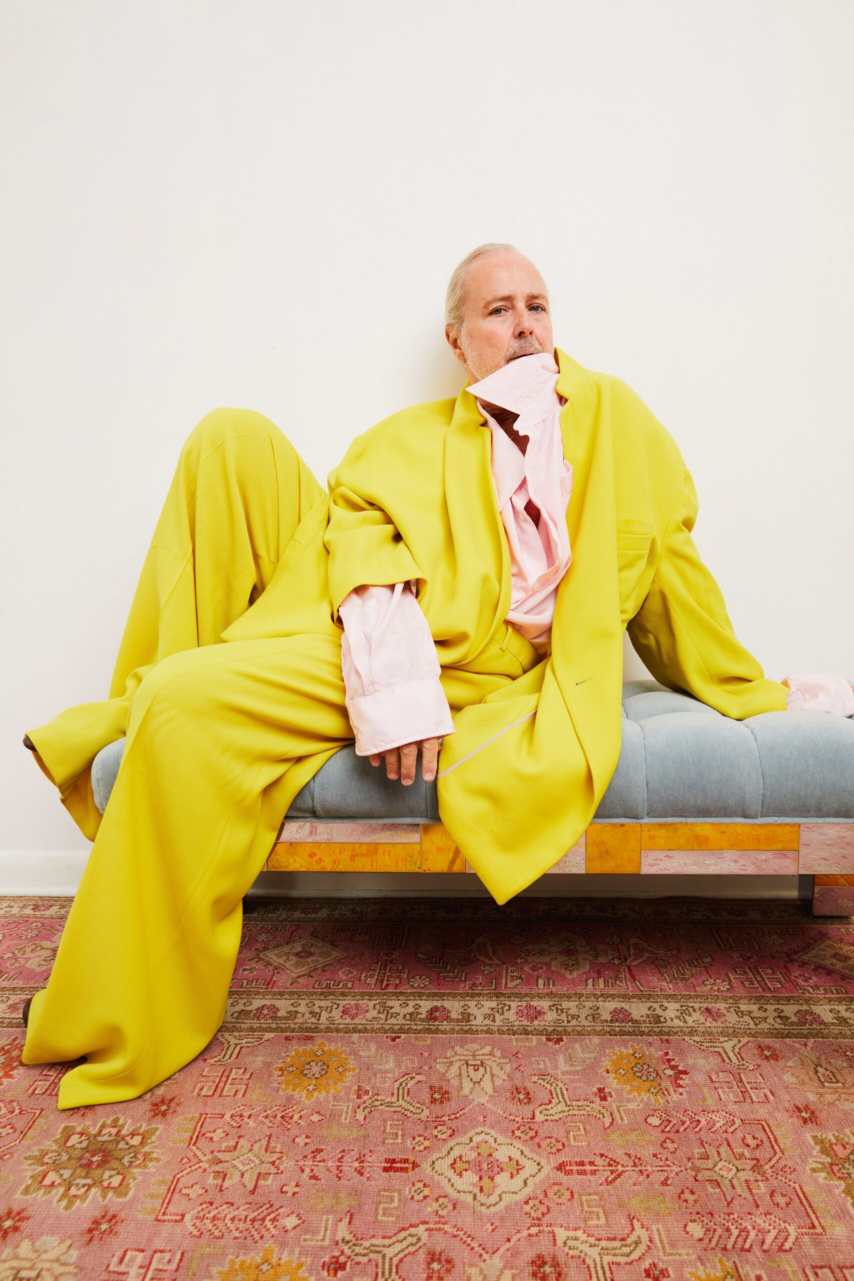oversized yellow suit with pink shirt