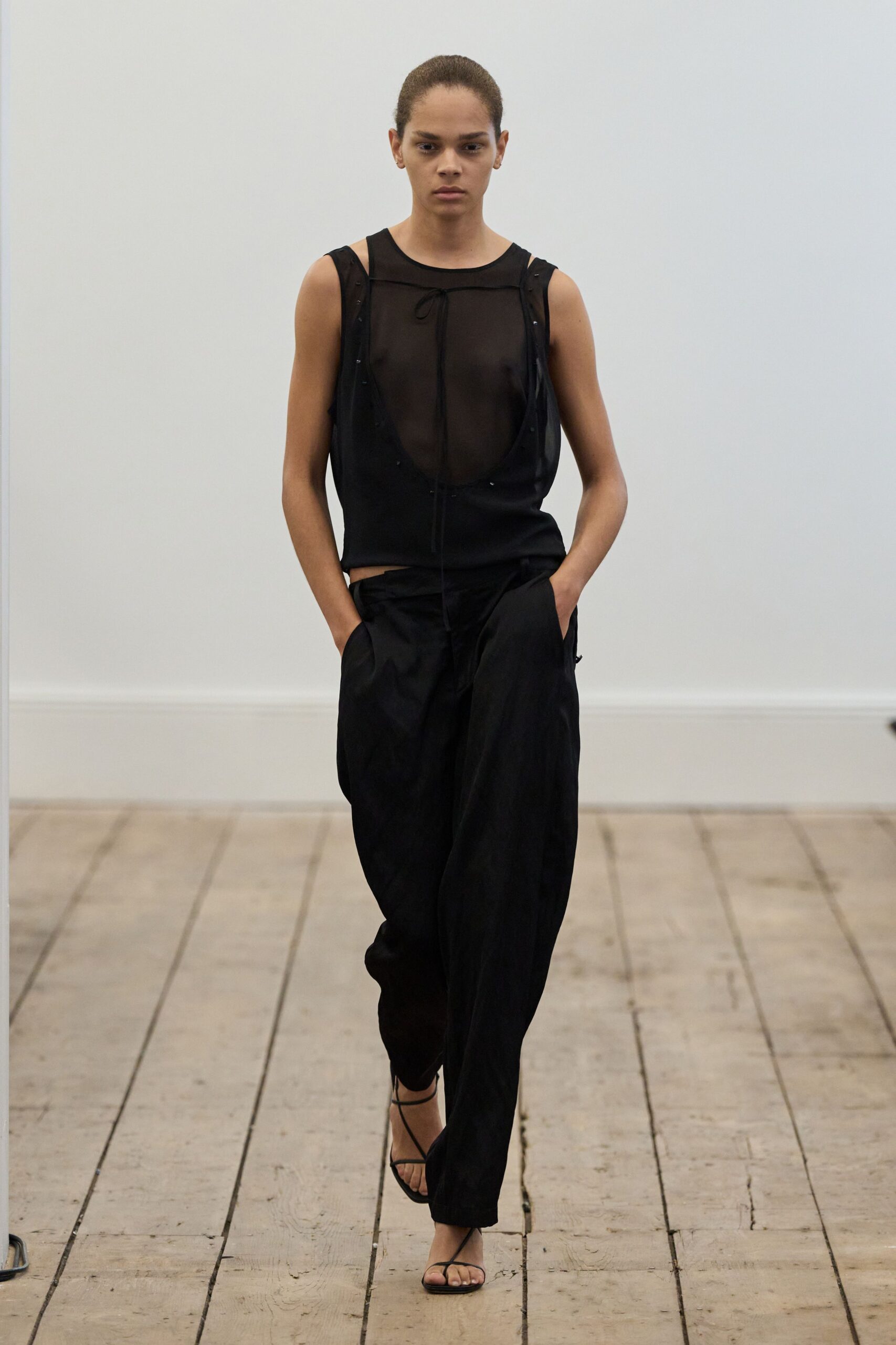 black silk sleeveless v-neck fitted sheer flowing top
