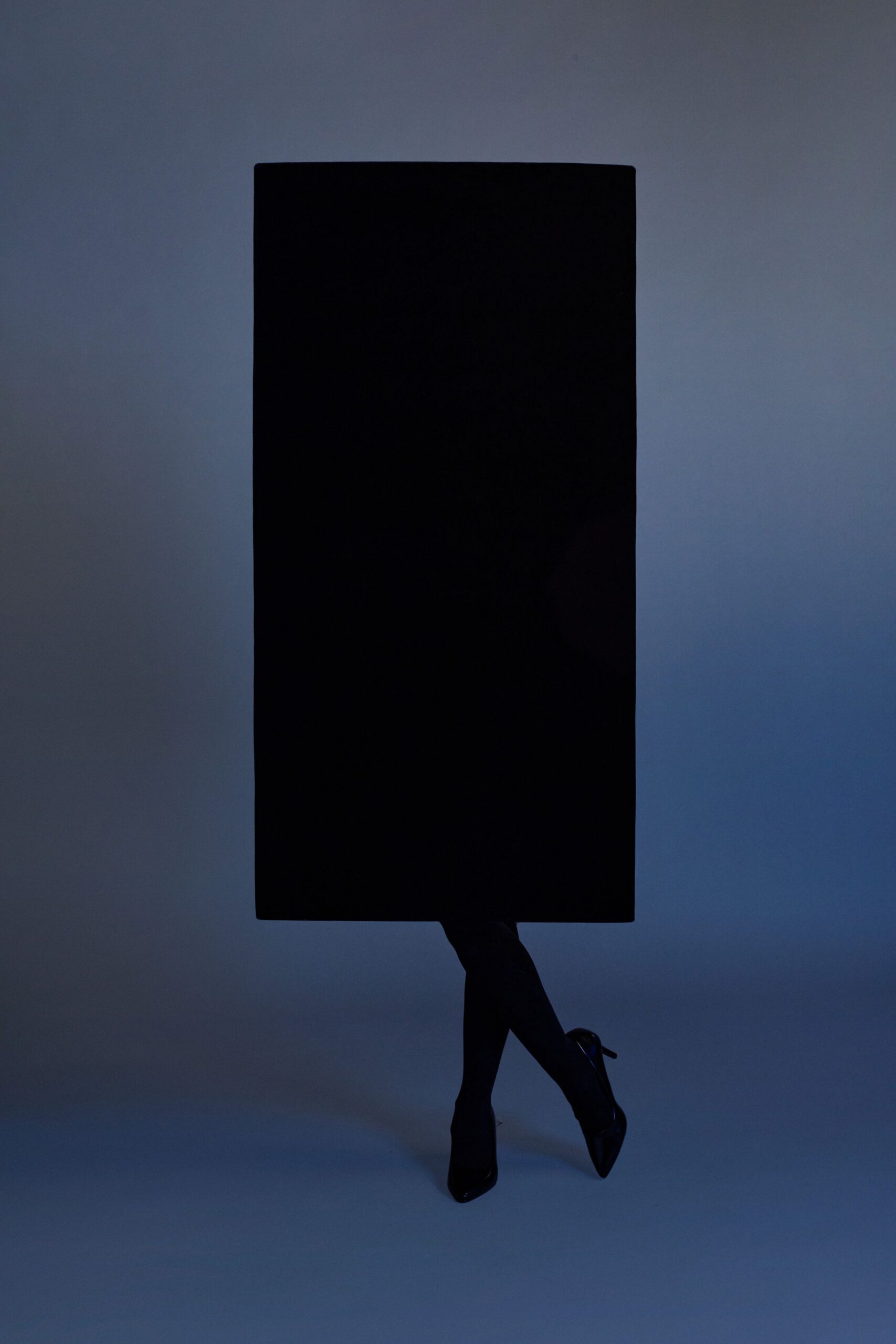 black fitted dress with black shoes