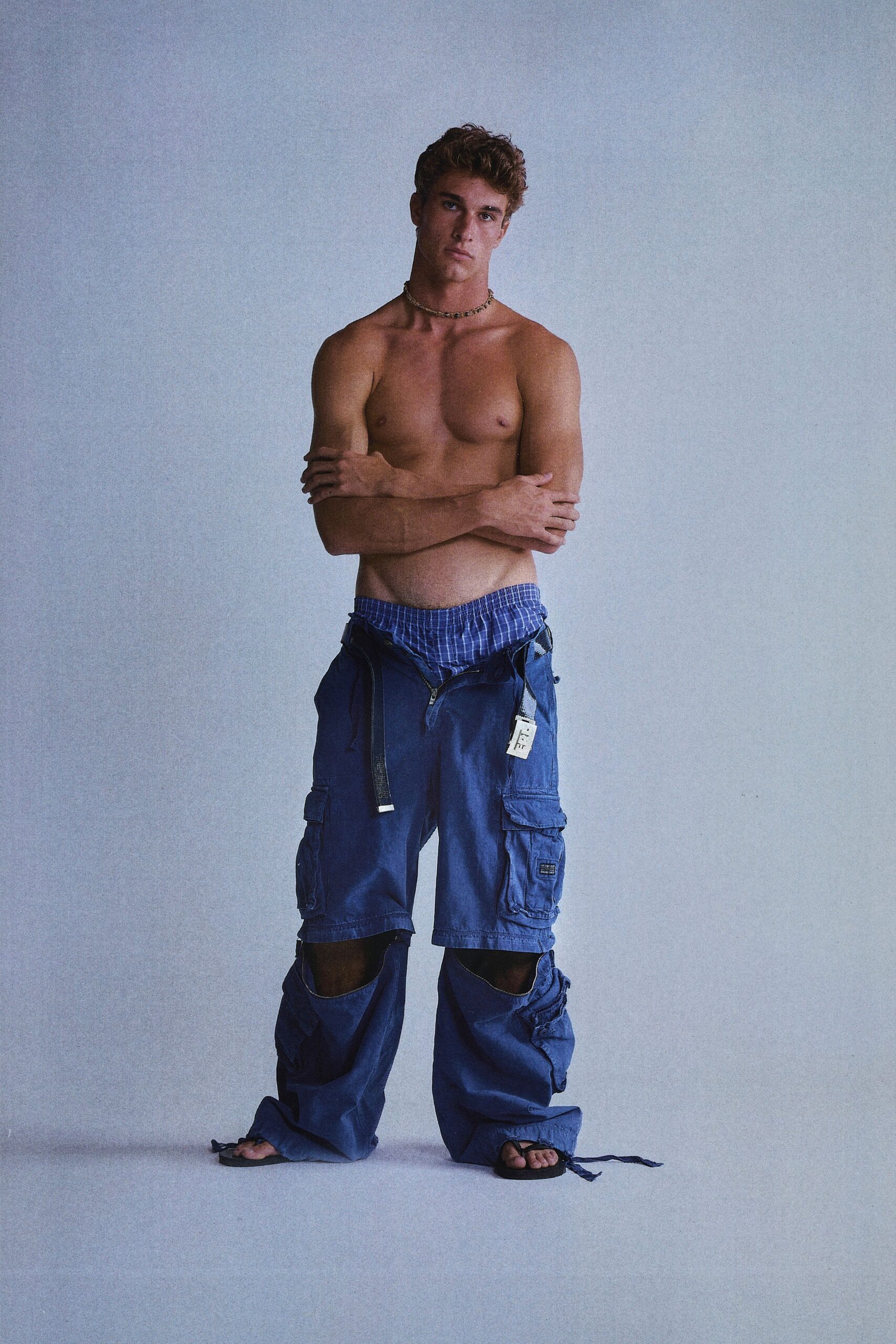 blue relaxed cargo pants with black shoes