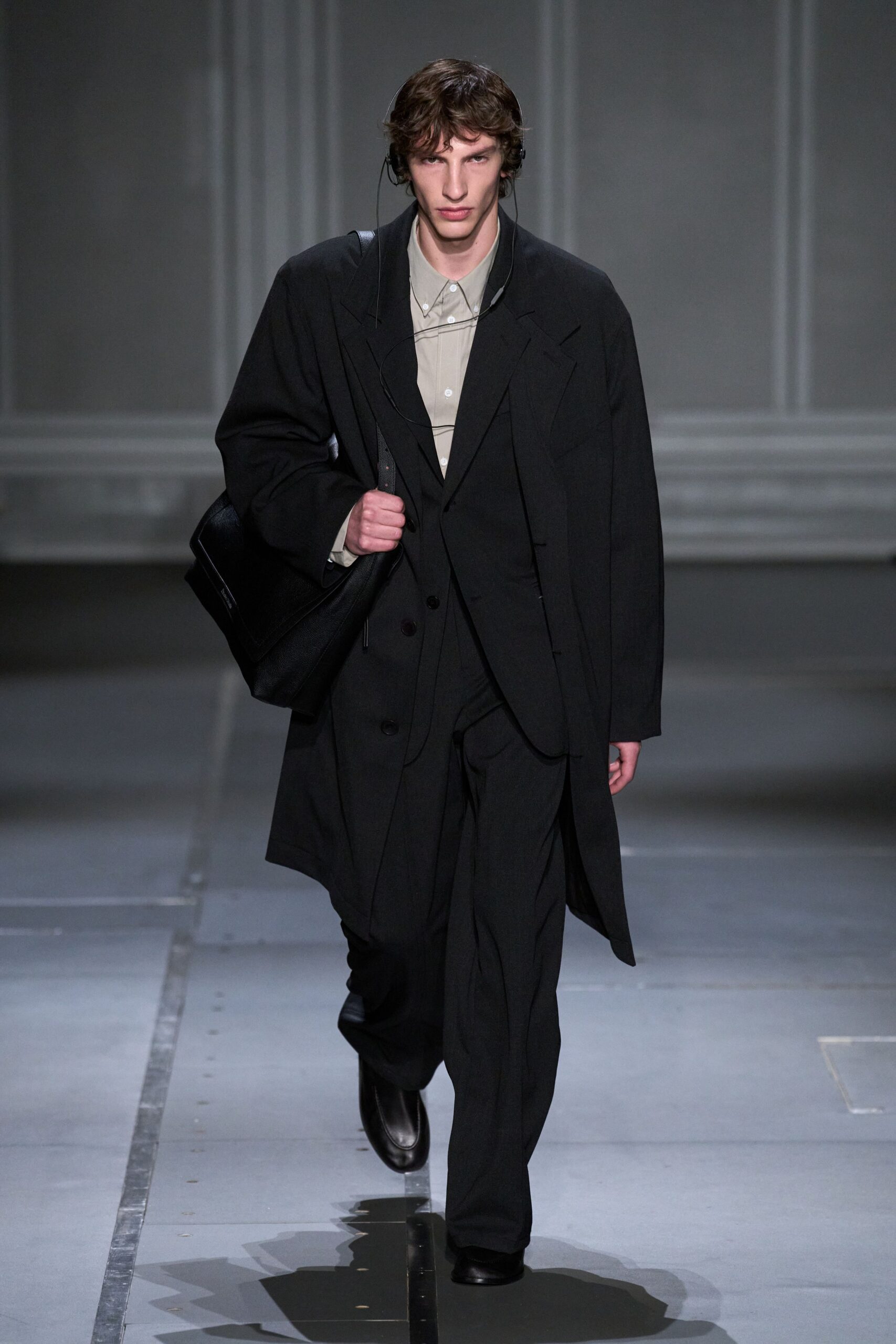 black oversized coat with beige shirt