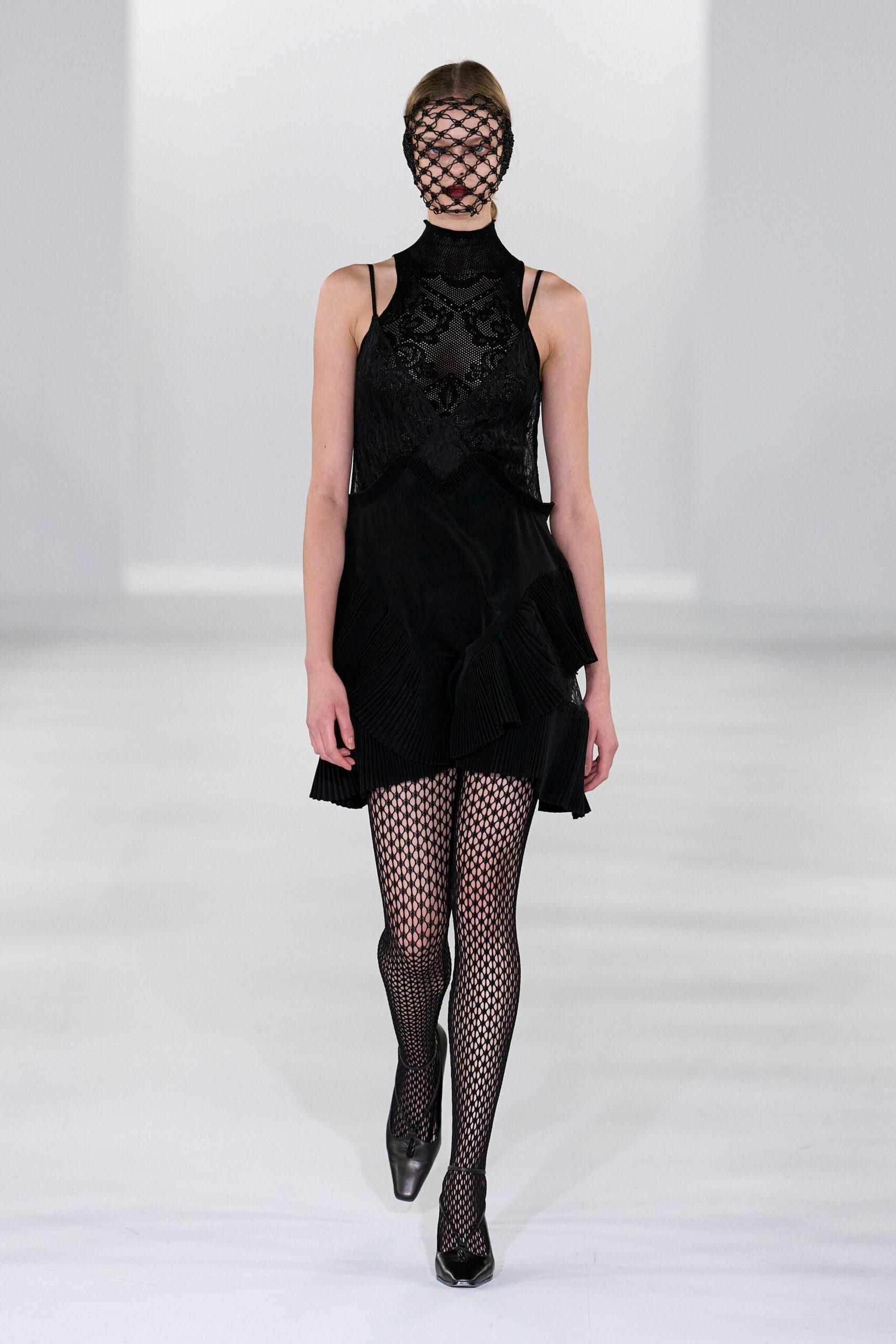 black lace sleeveless high-neck fitted pleated ruffled dress