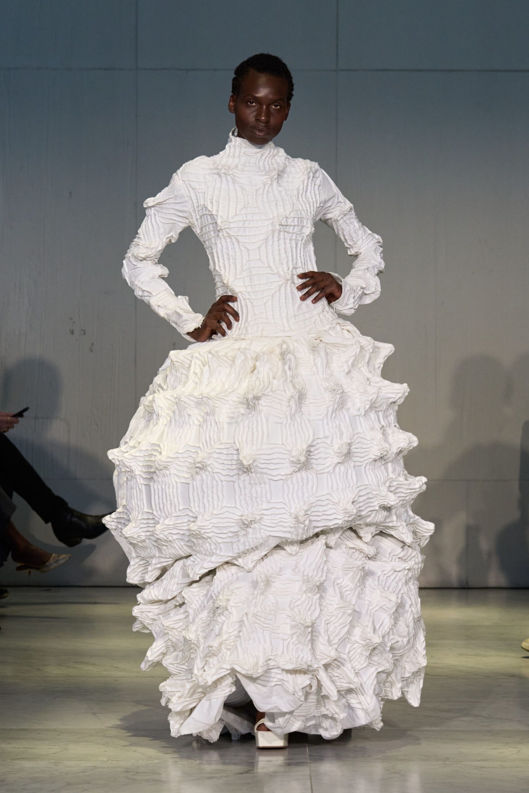 white ruffled maxi gown with shoes
