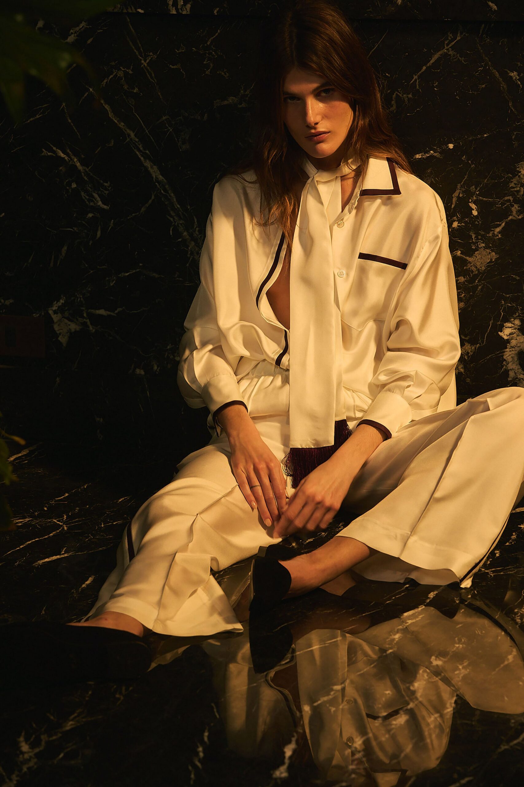 white silk long-sleeve collared relaxed buttoned shirt