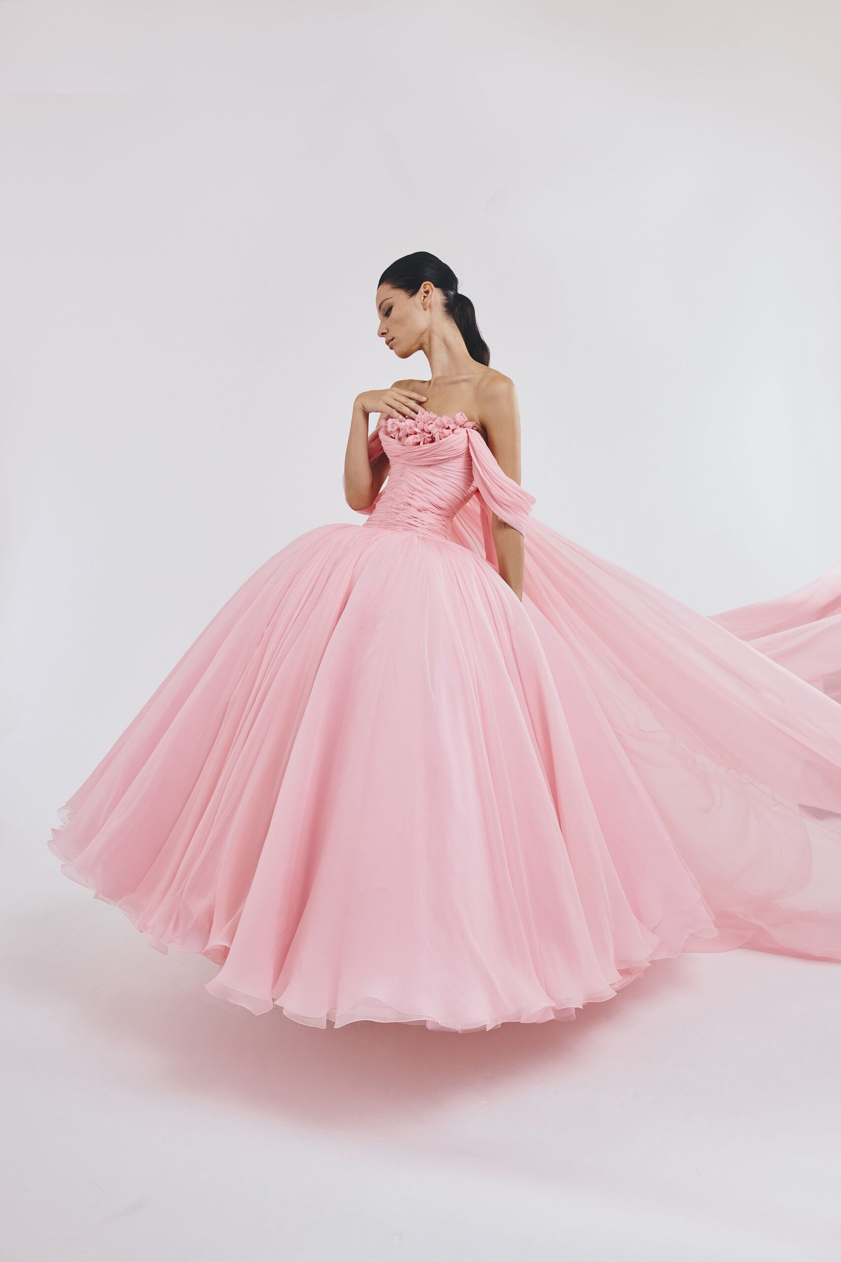 pink strapless flowing gown