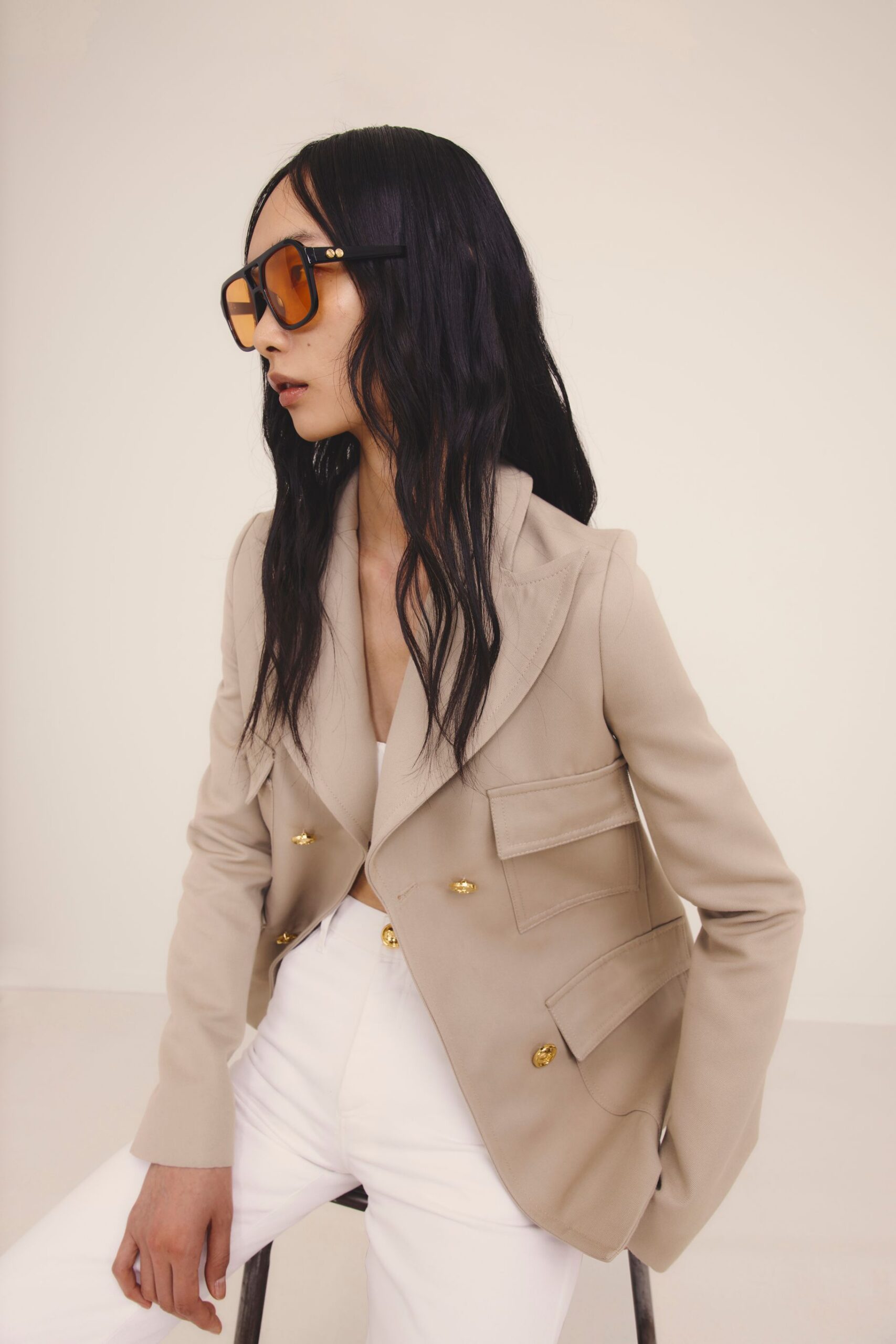beige tailored blazer with white pants