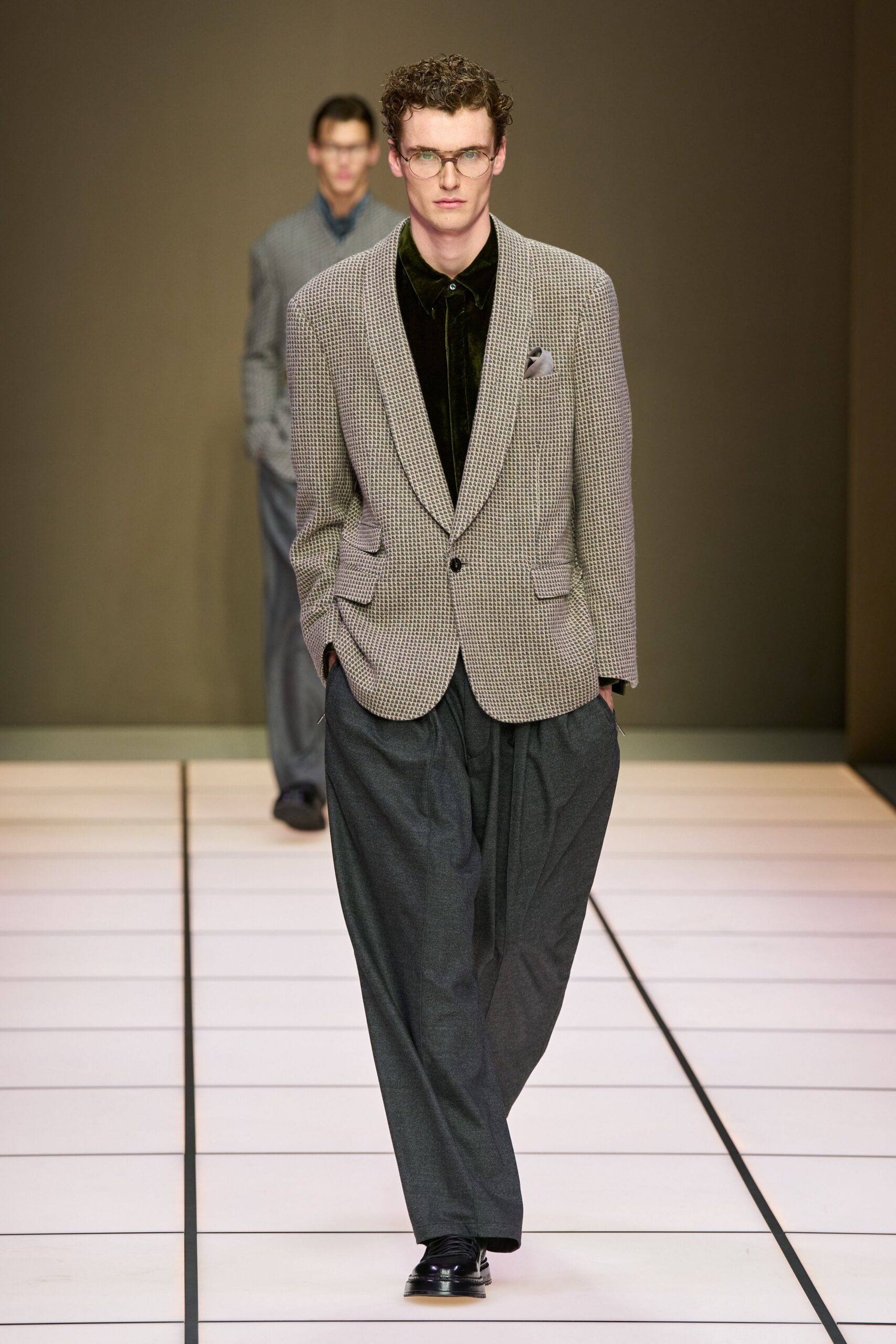 gray tailored blazer with black shirt