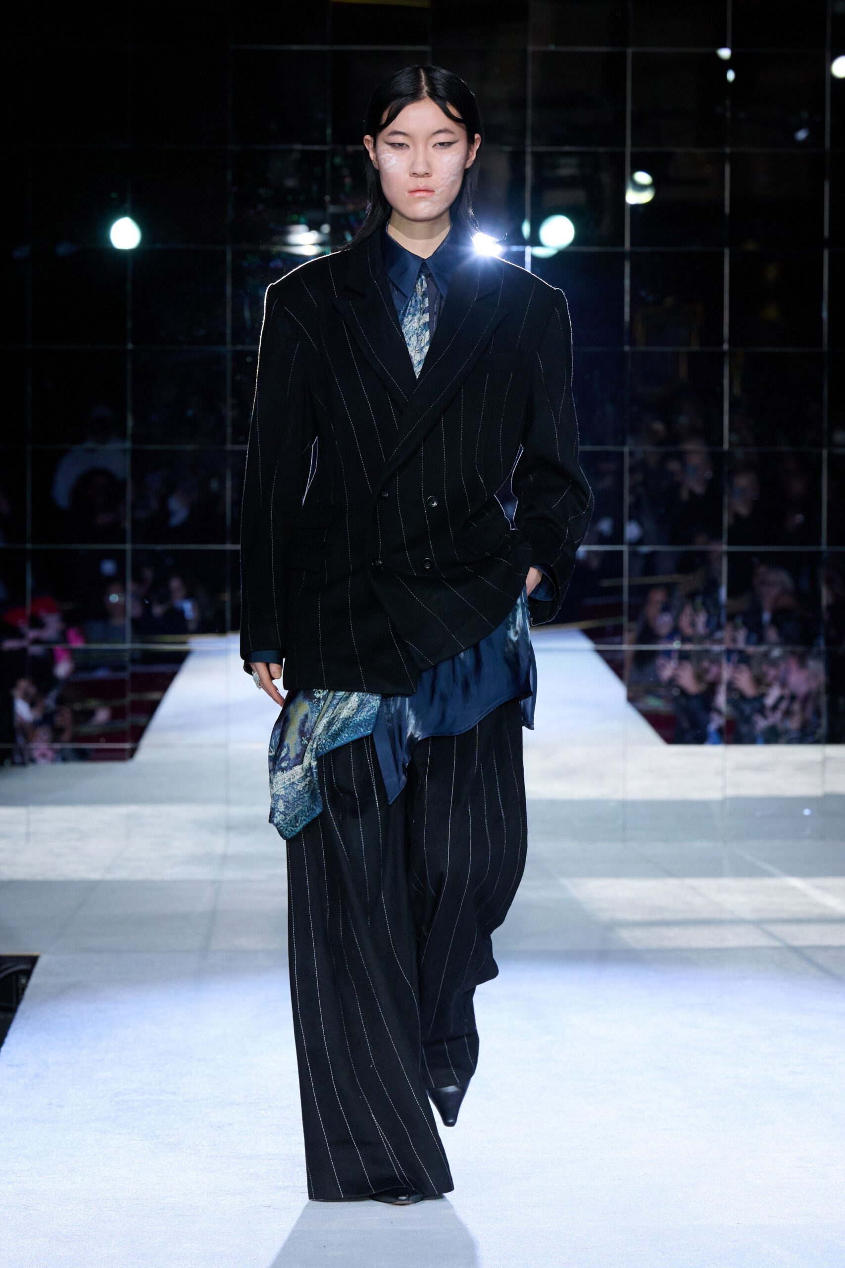 black striped tailored suit with blue shirt