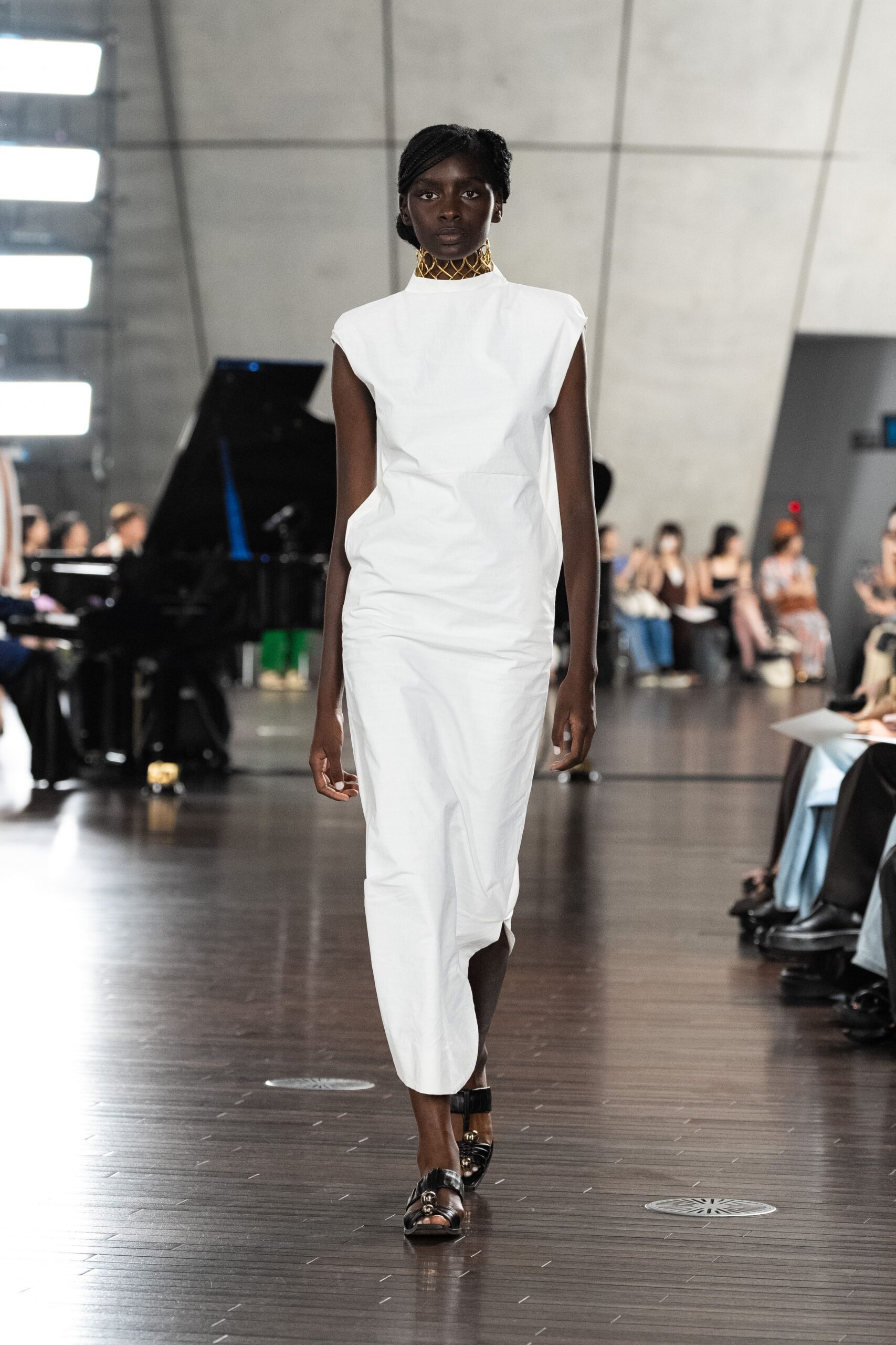 white fitted midi dress with black shoes