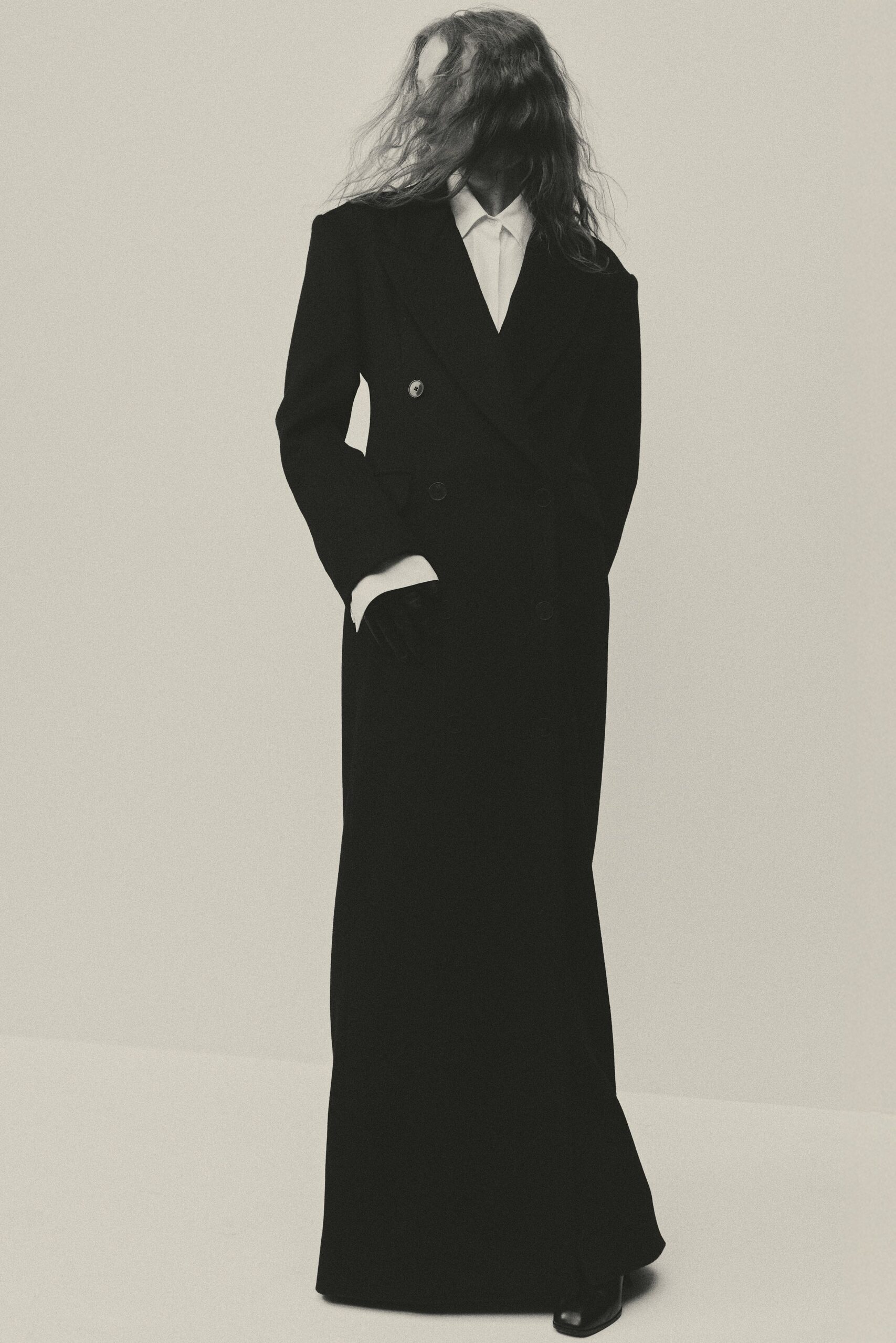 black wool long-sleeve collared fitted maxi coat