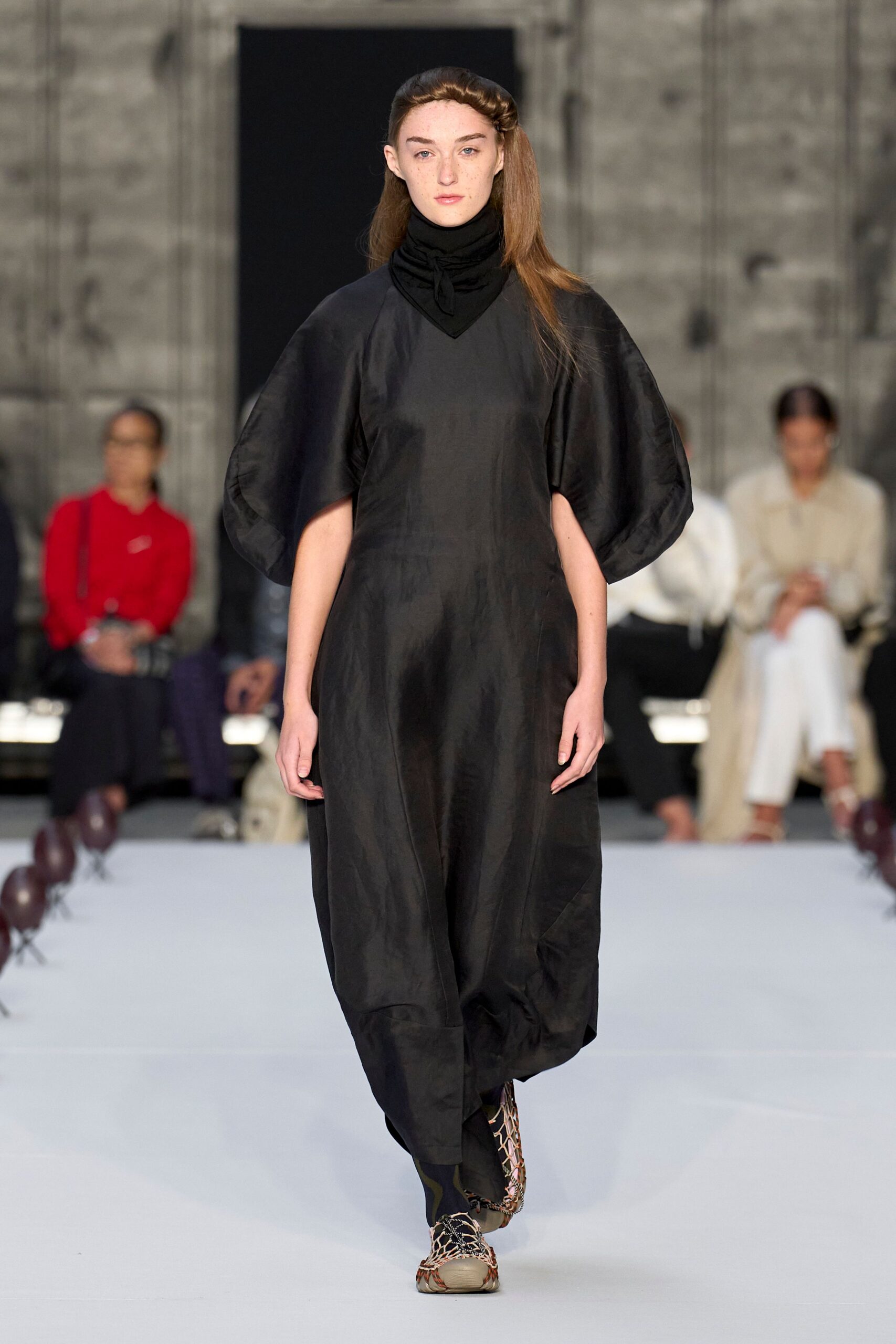 black silk sleeveless high-neck relaxed draped flowing dress