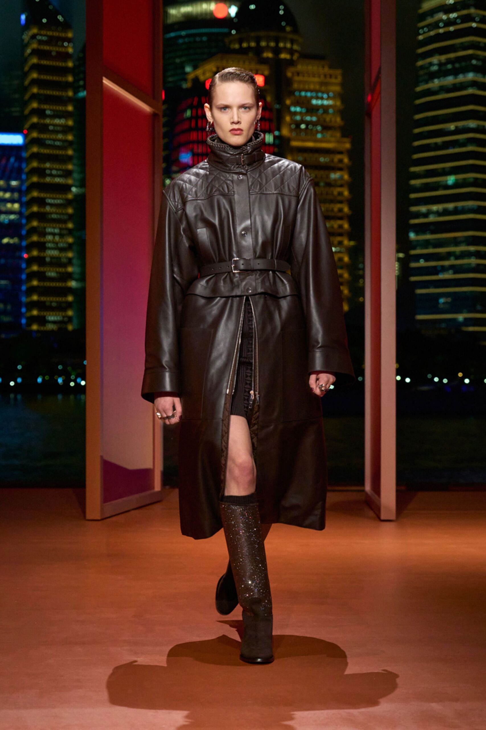 black leather fitted shiny boots
