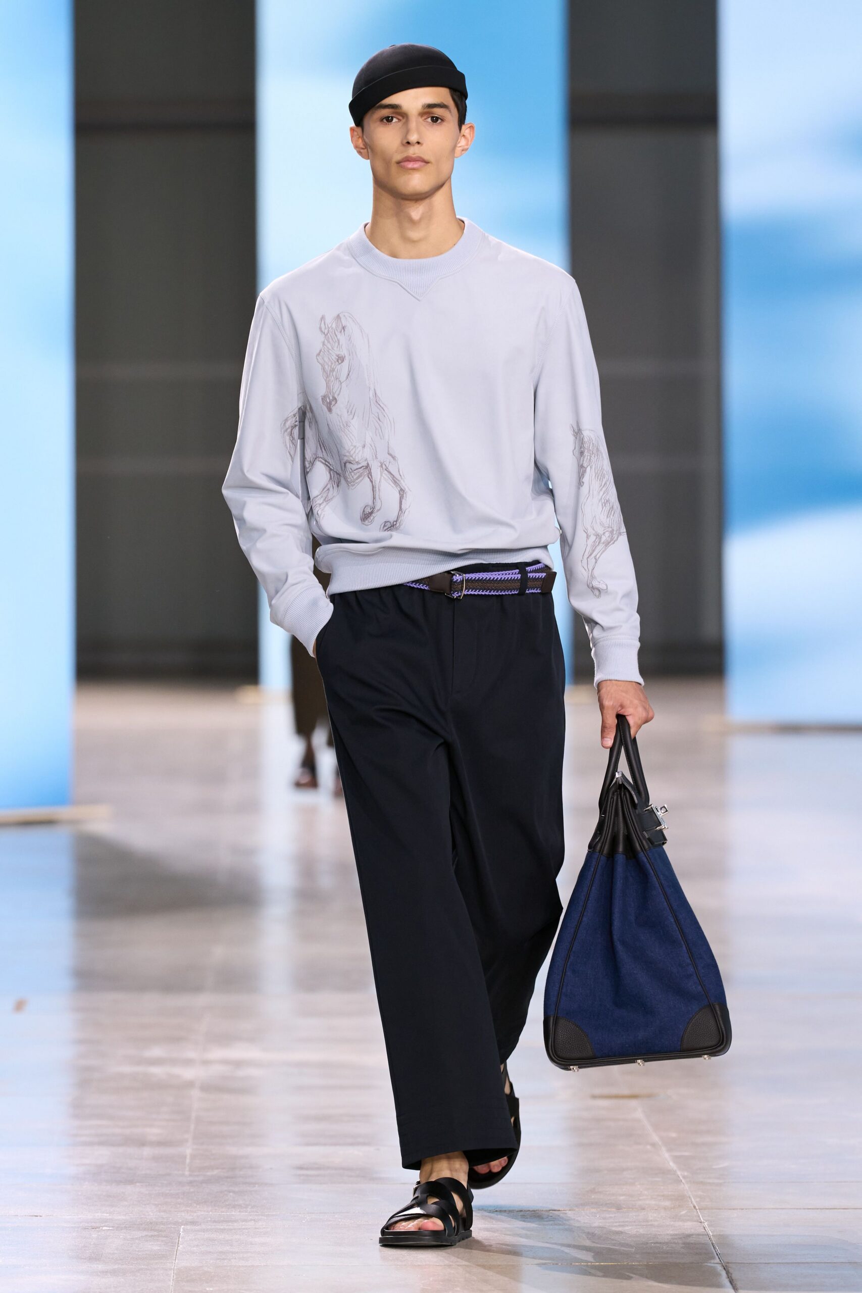 light blue relaxed top with navy pants
