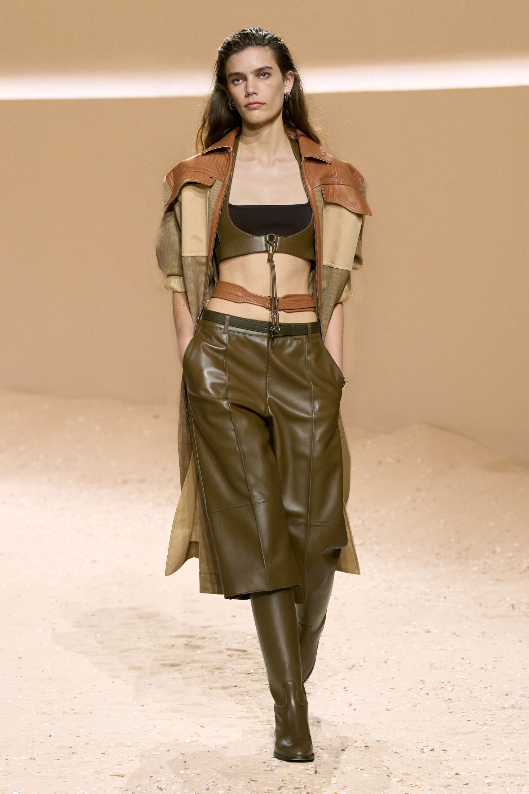 beige leather coat with black top