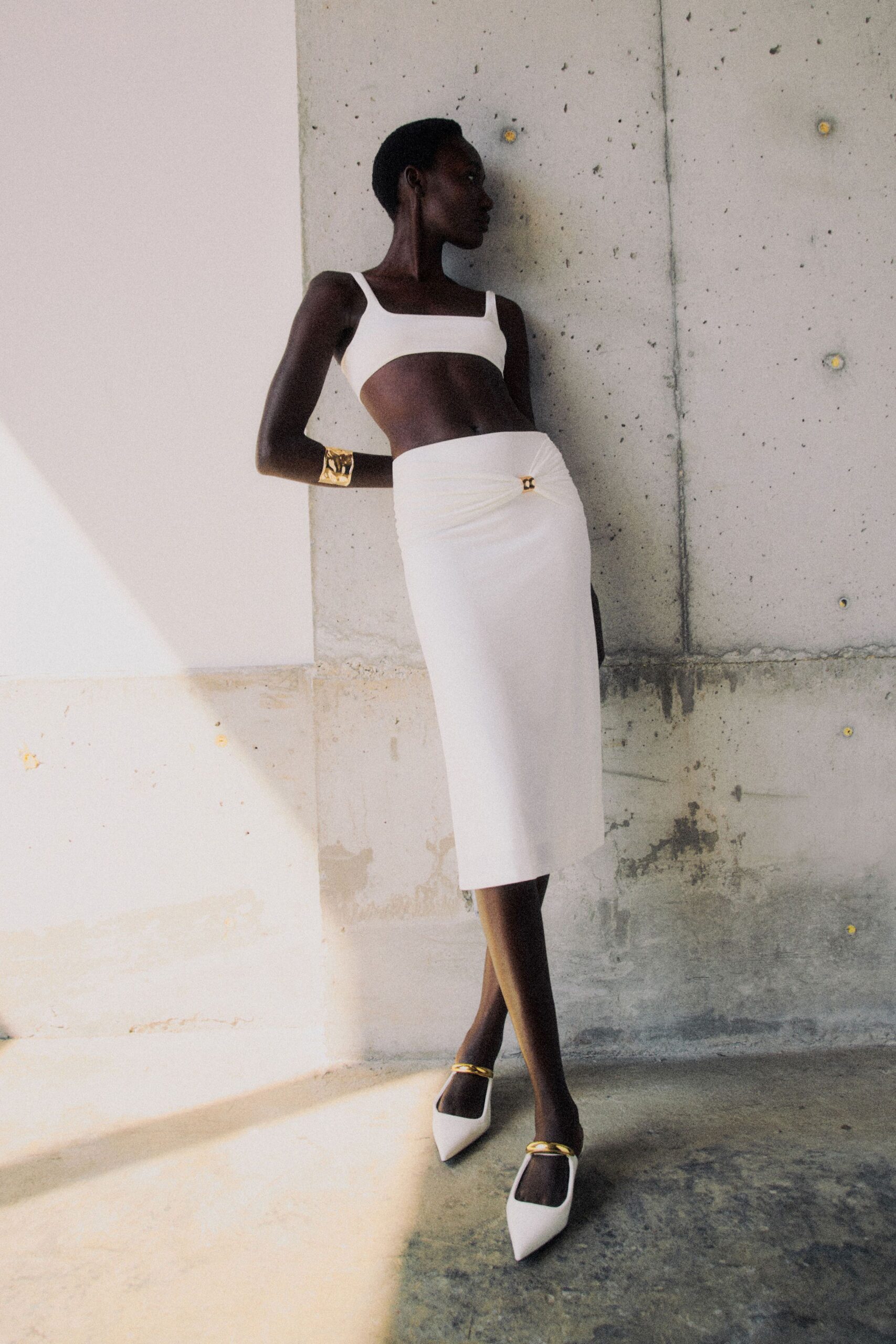 white fitted top and skirt
