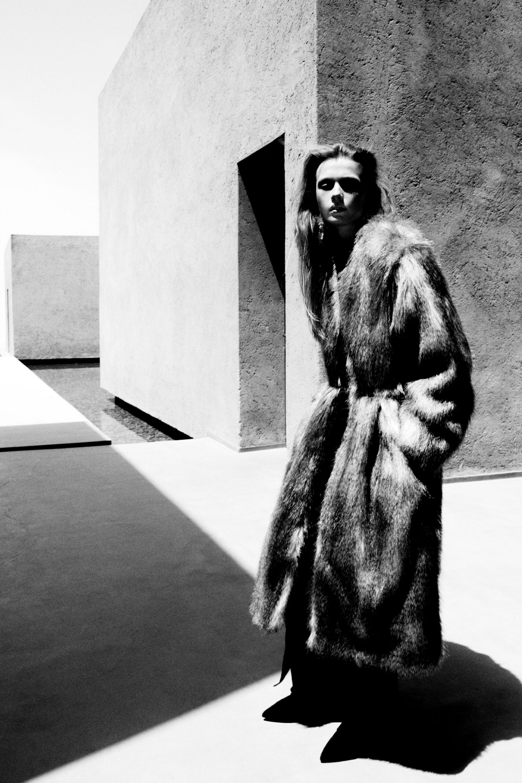 gray faux-fur belted coat with black shoes