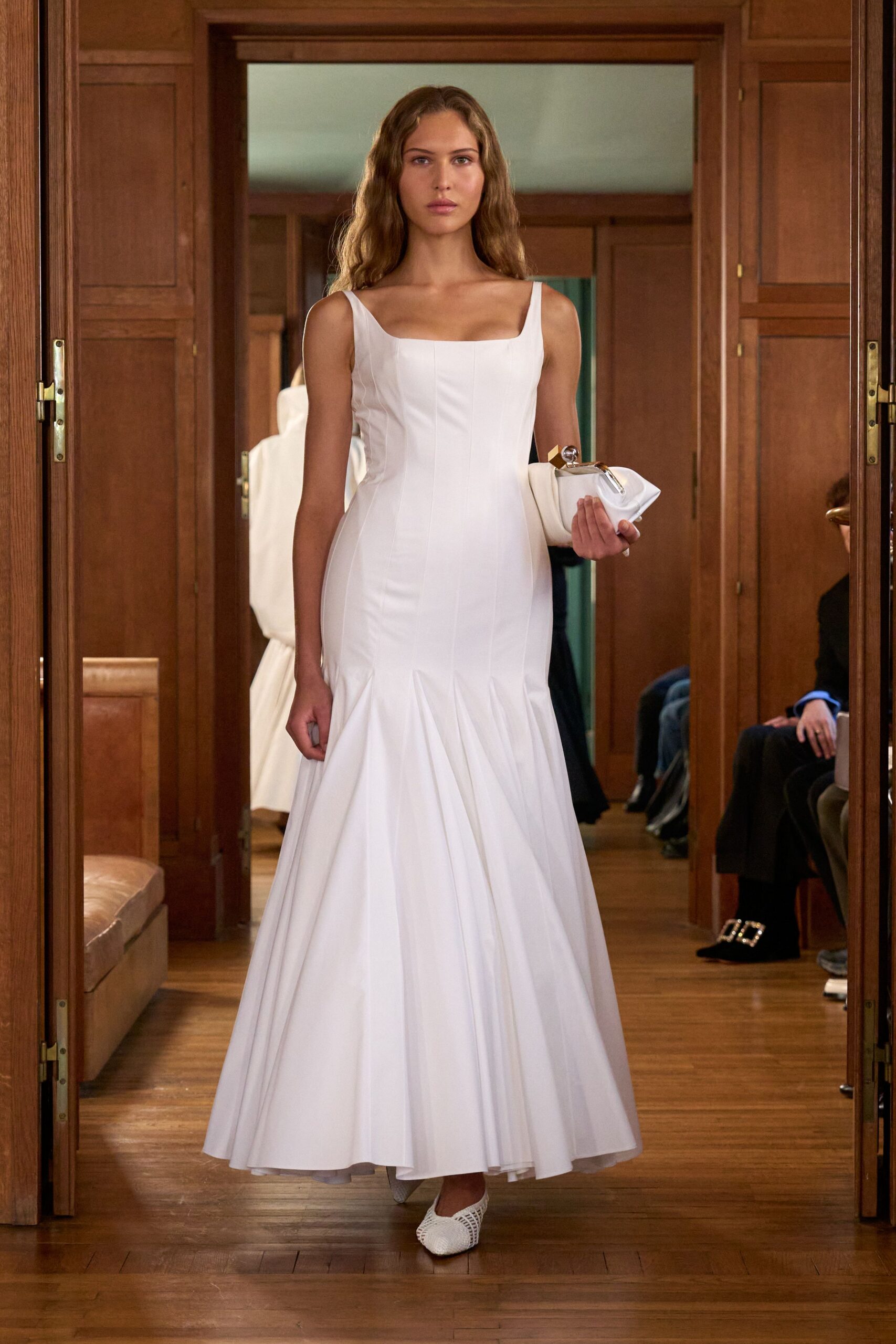 white fitted gown with pleats