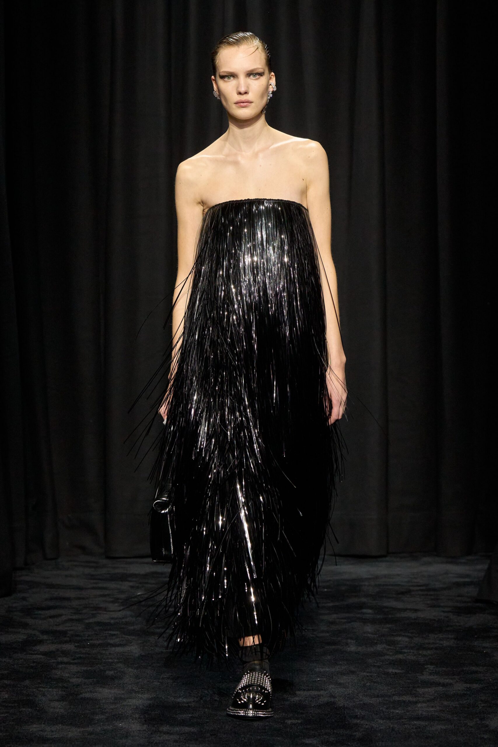 black fringed strapless gown