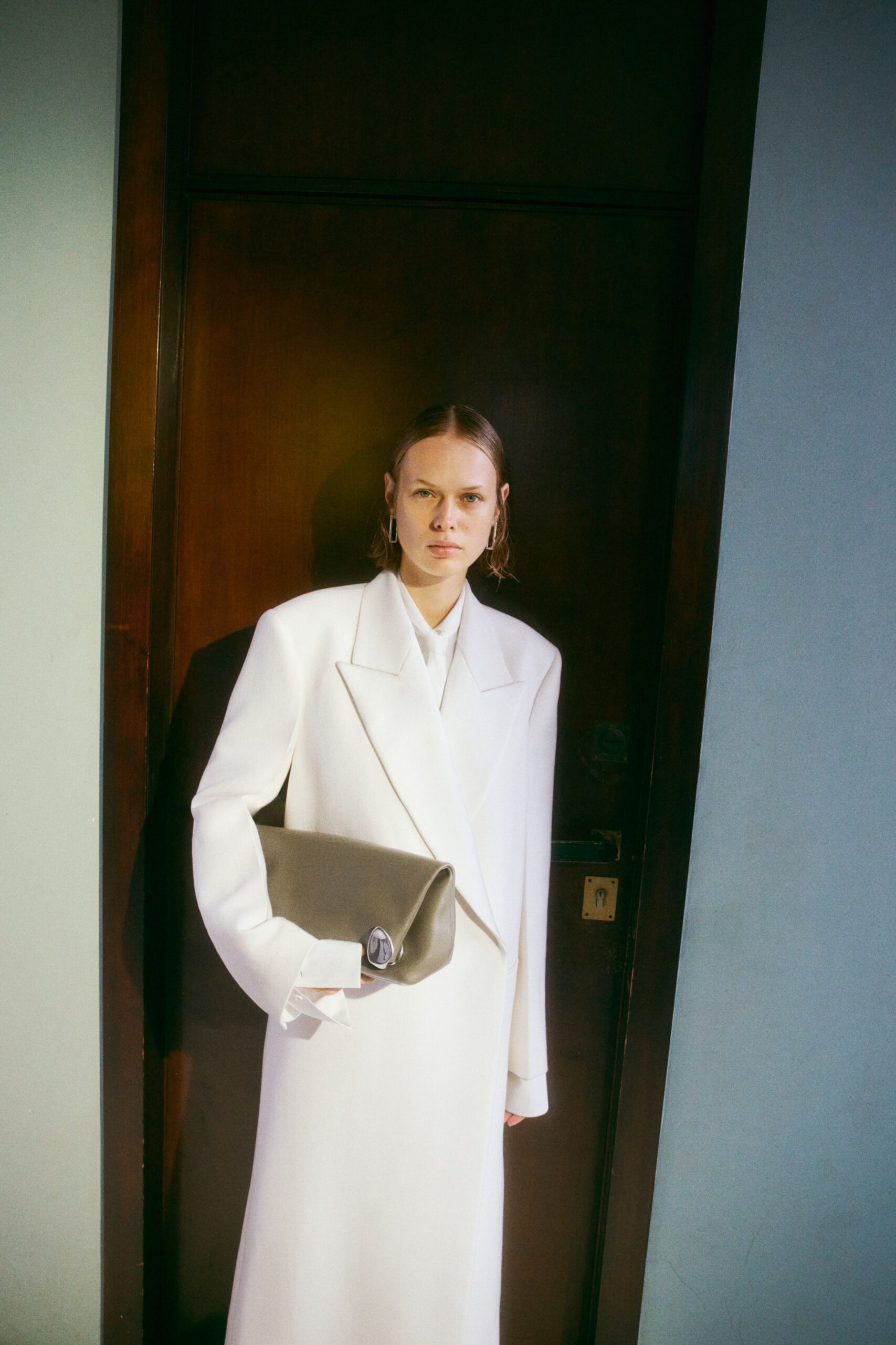 white wool long-sleeve collared oversized buttoned maxi coat