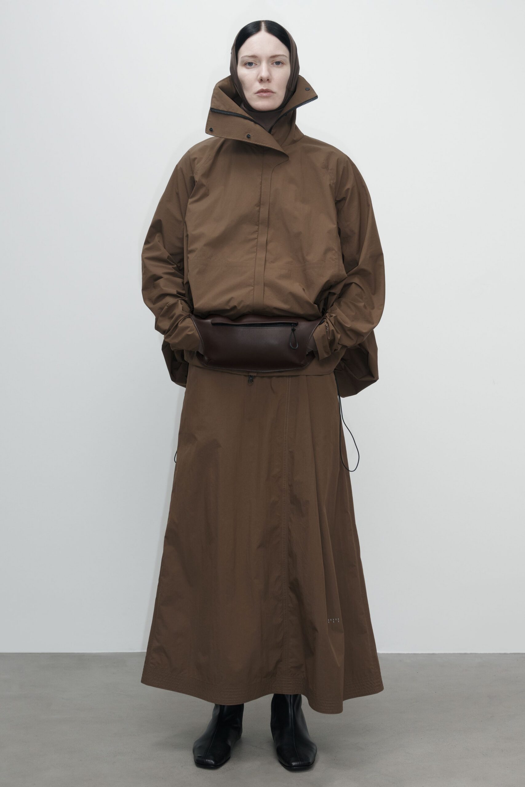 brown oversized coat with black boots
