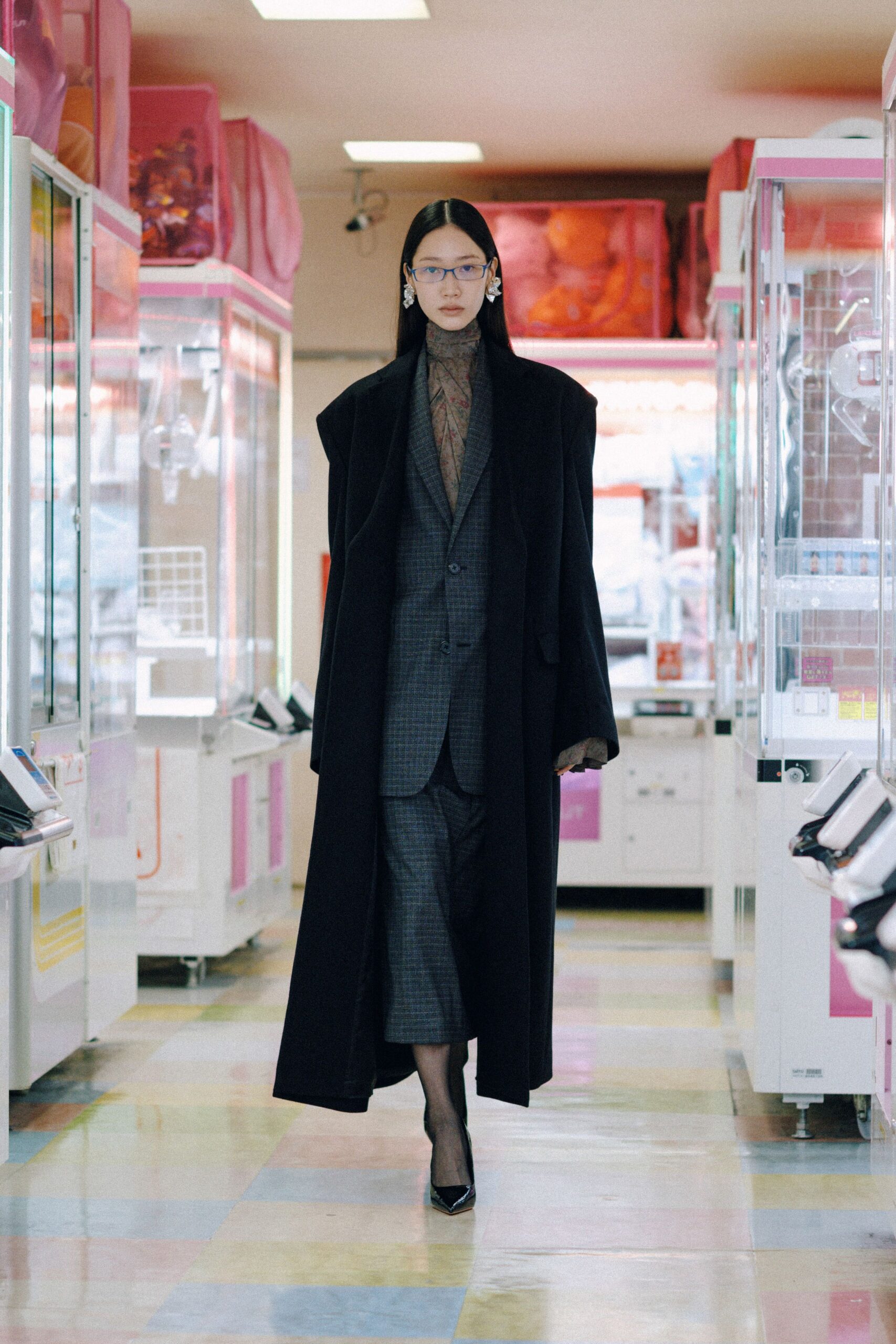 black oversized coat with gray suit