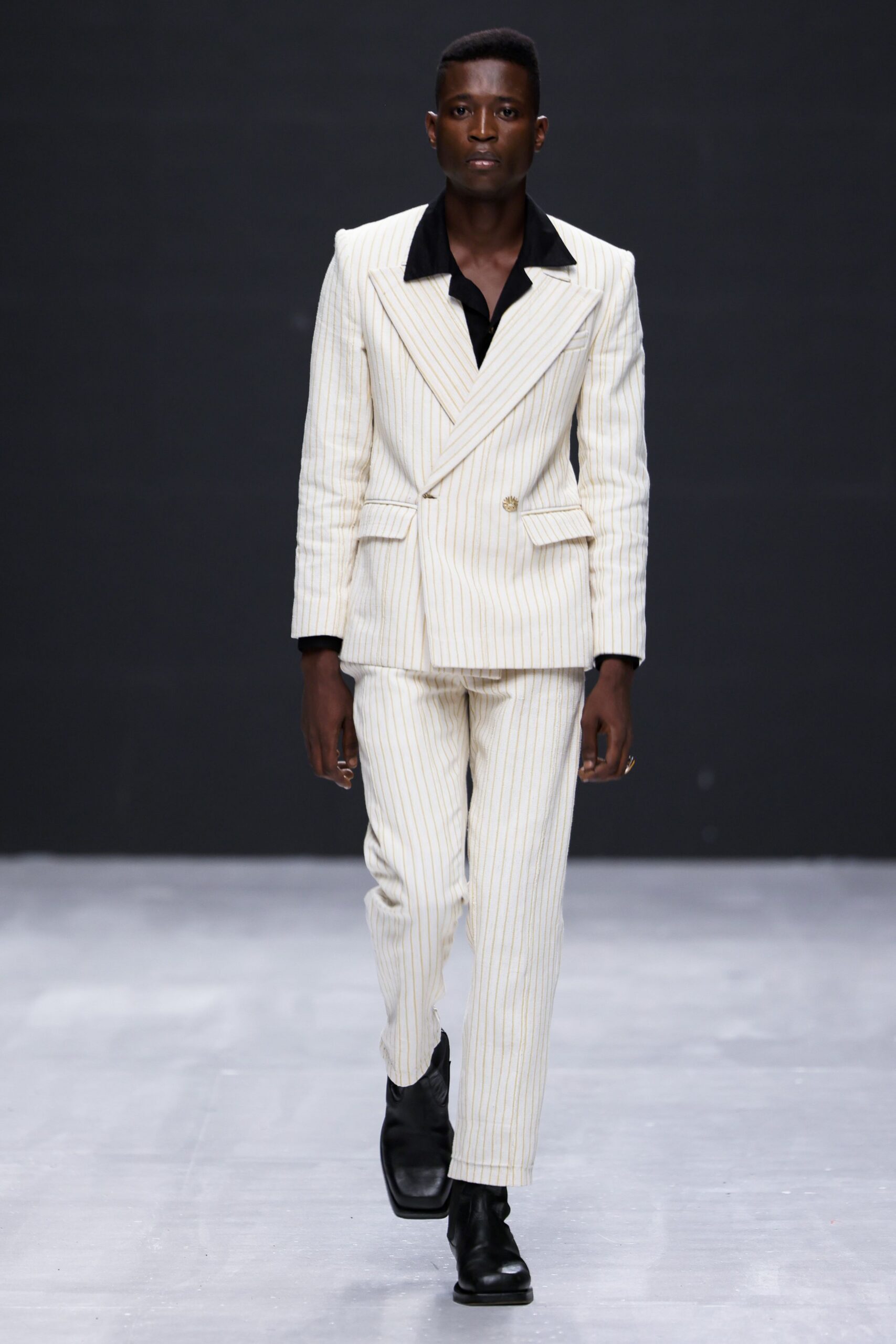 striped tailored suit with boots