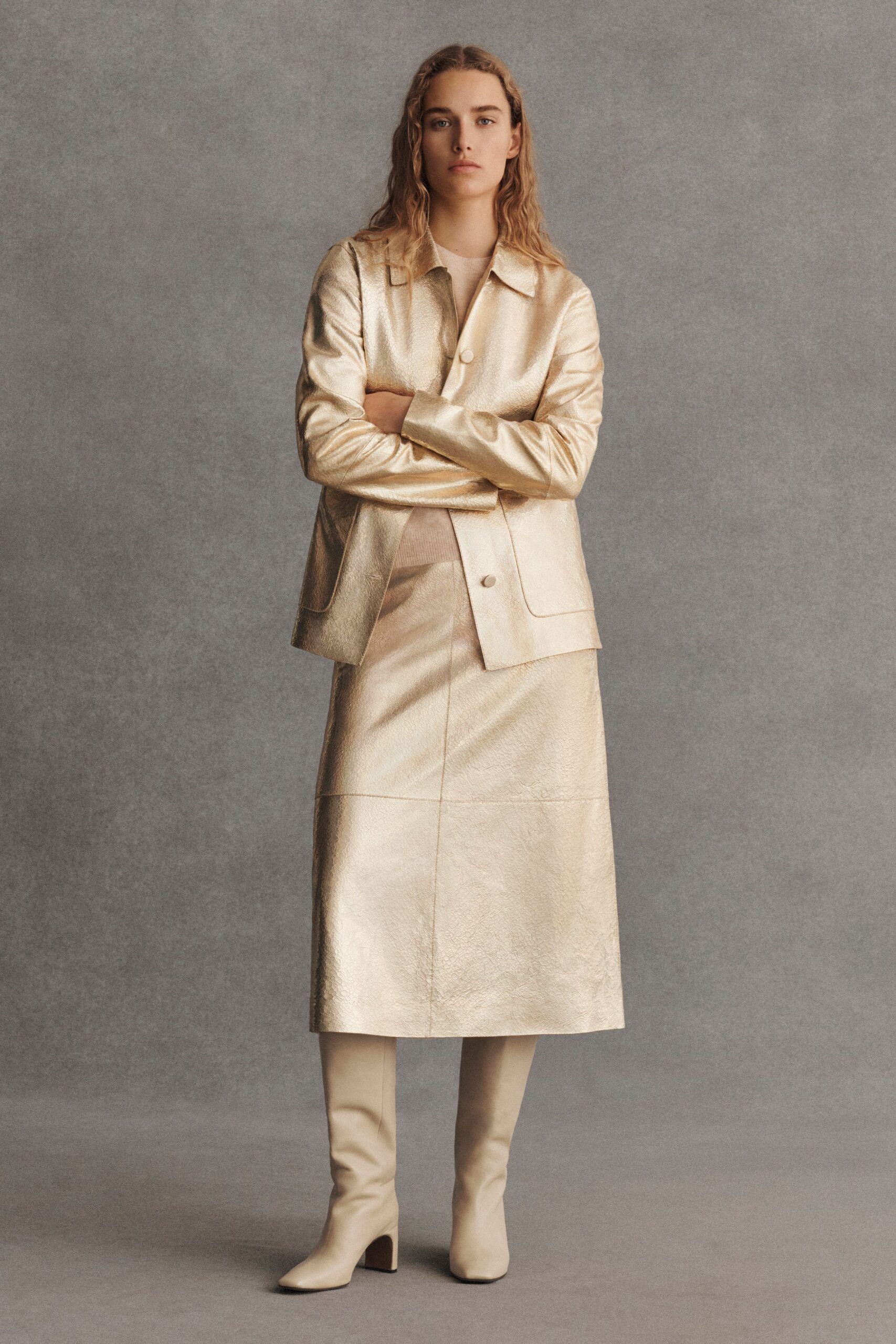 gold metallic long-sleeve collared structured buttoned shiny jacket
