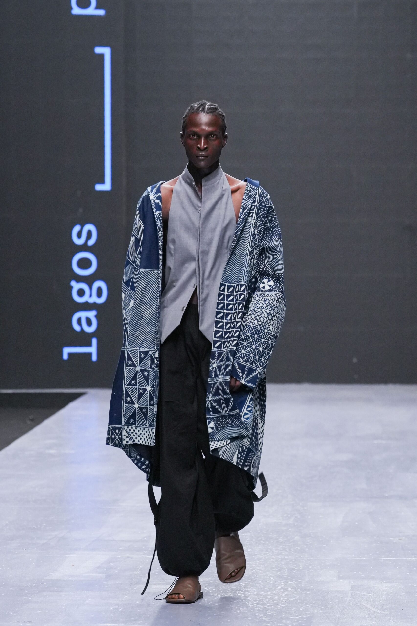 blue printed coat gray shirt black pants