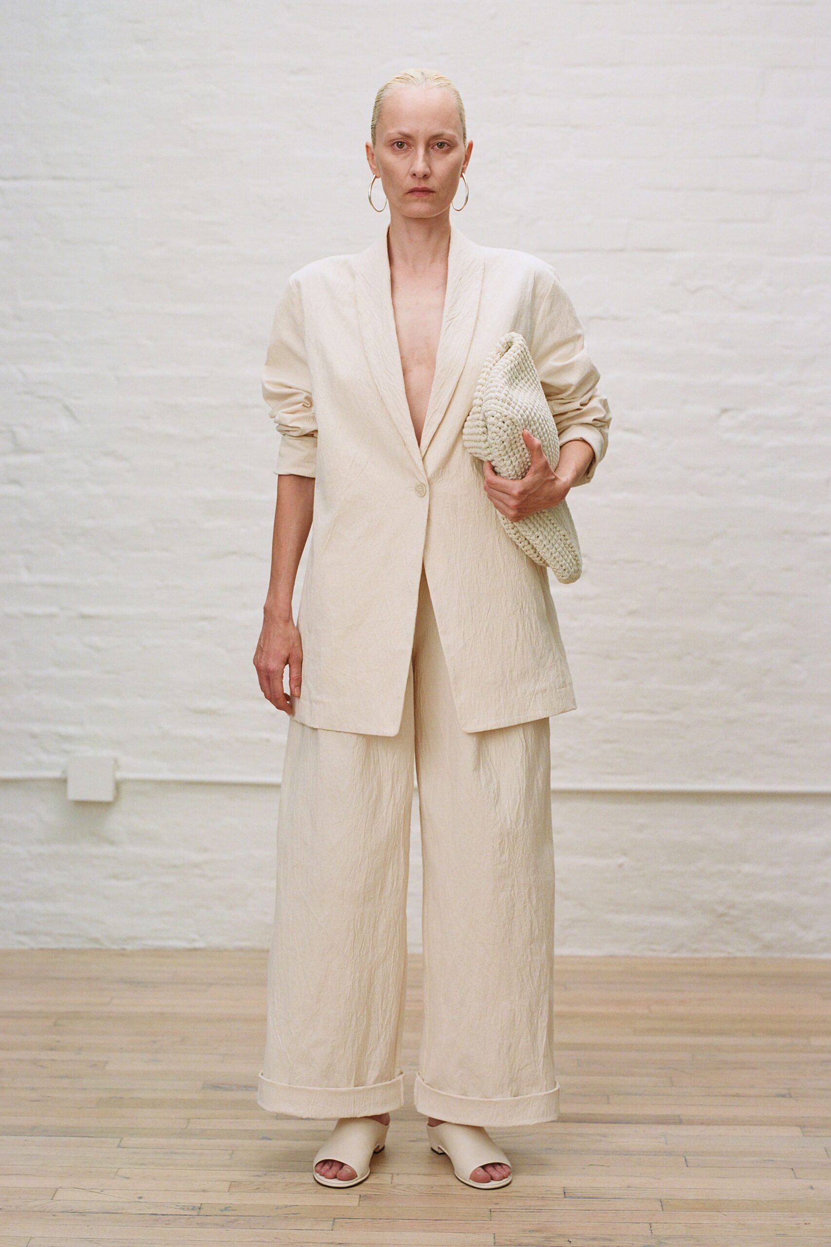 beige cotton blazer and wide-leg pants