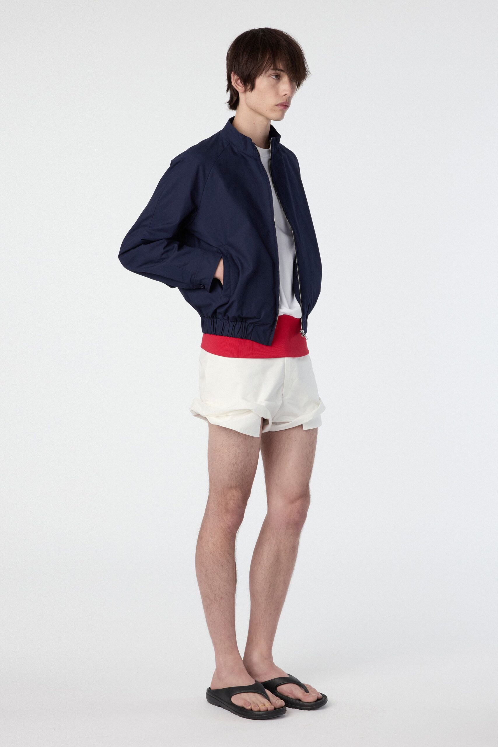 blue jacket white t-shirt shorts