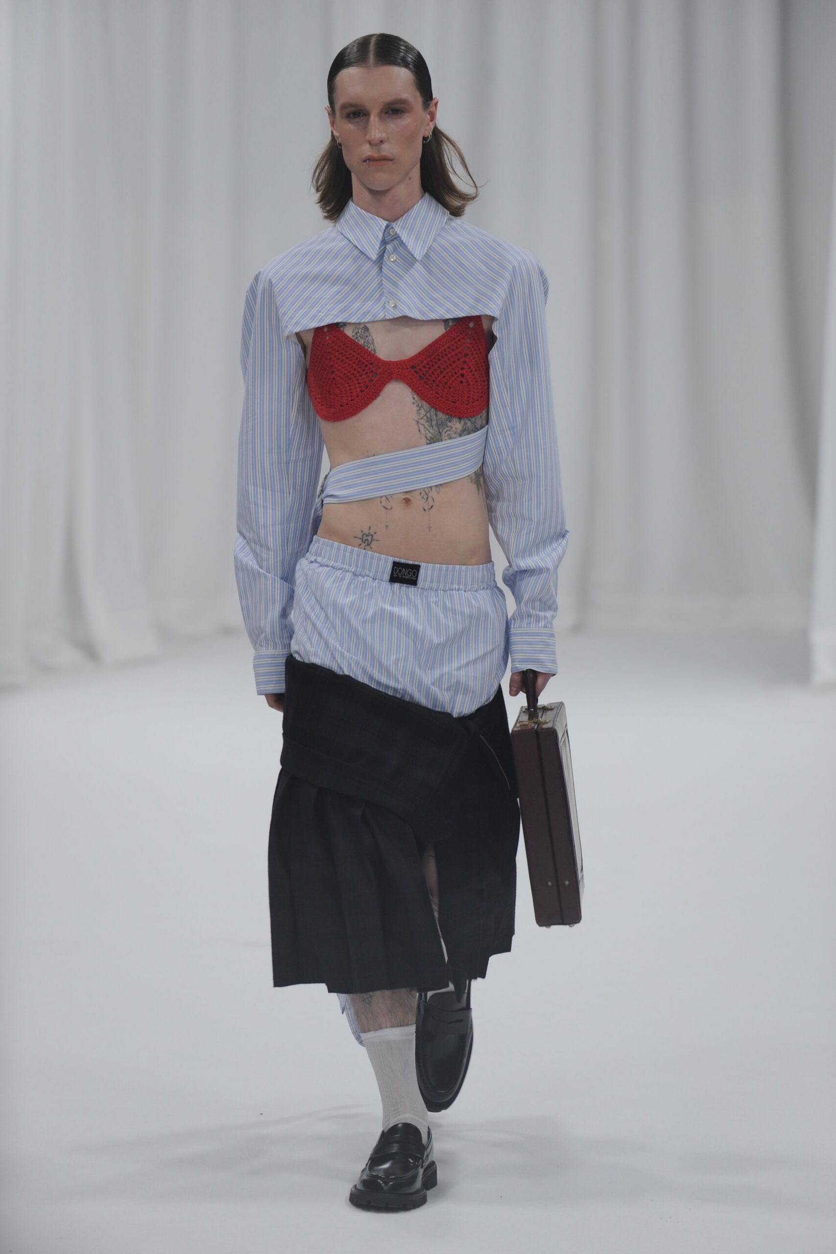 blue and white fitted shirt with black skirt