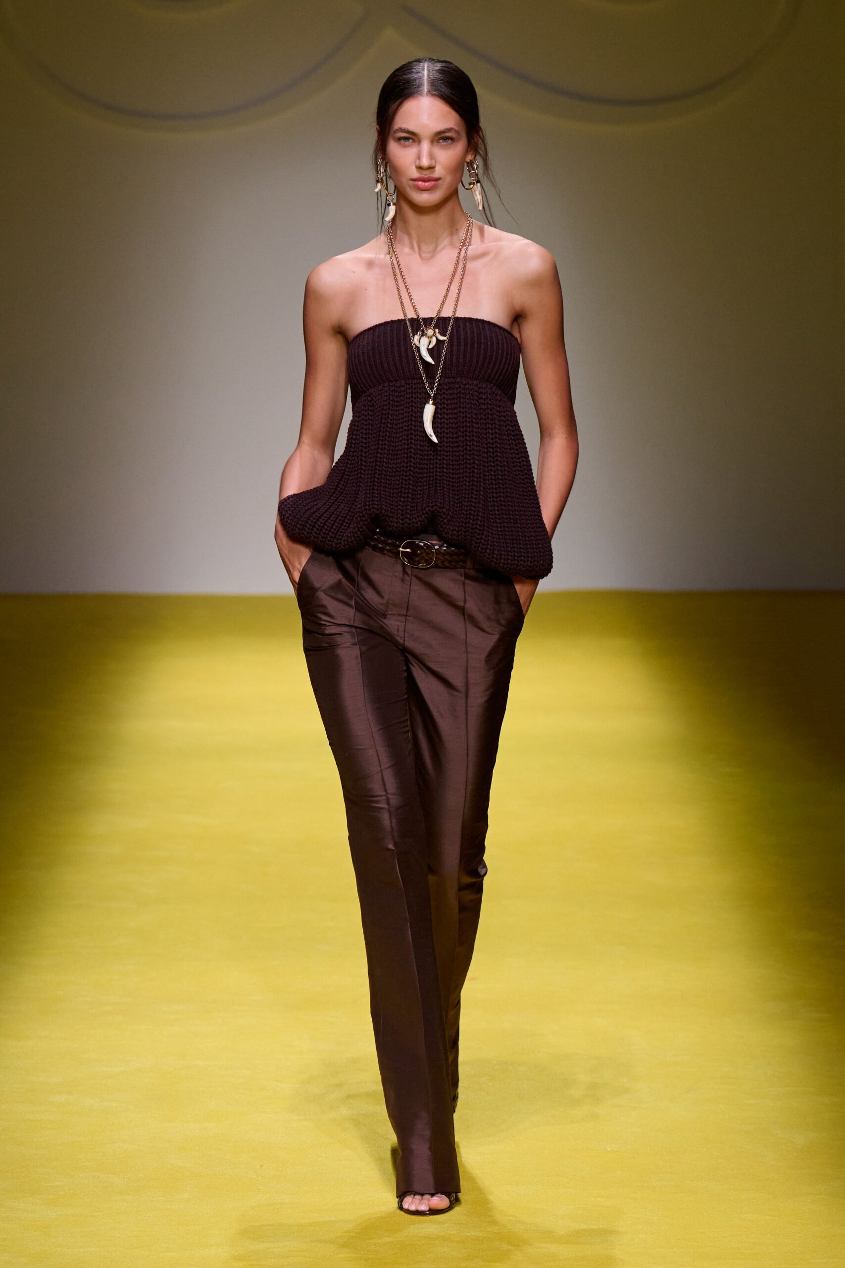 brown fitted top with slim pants