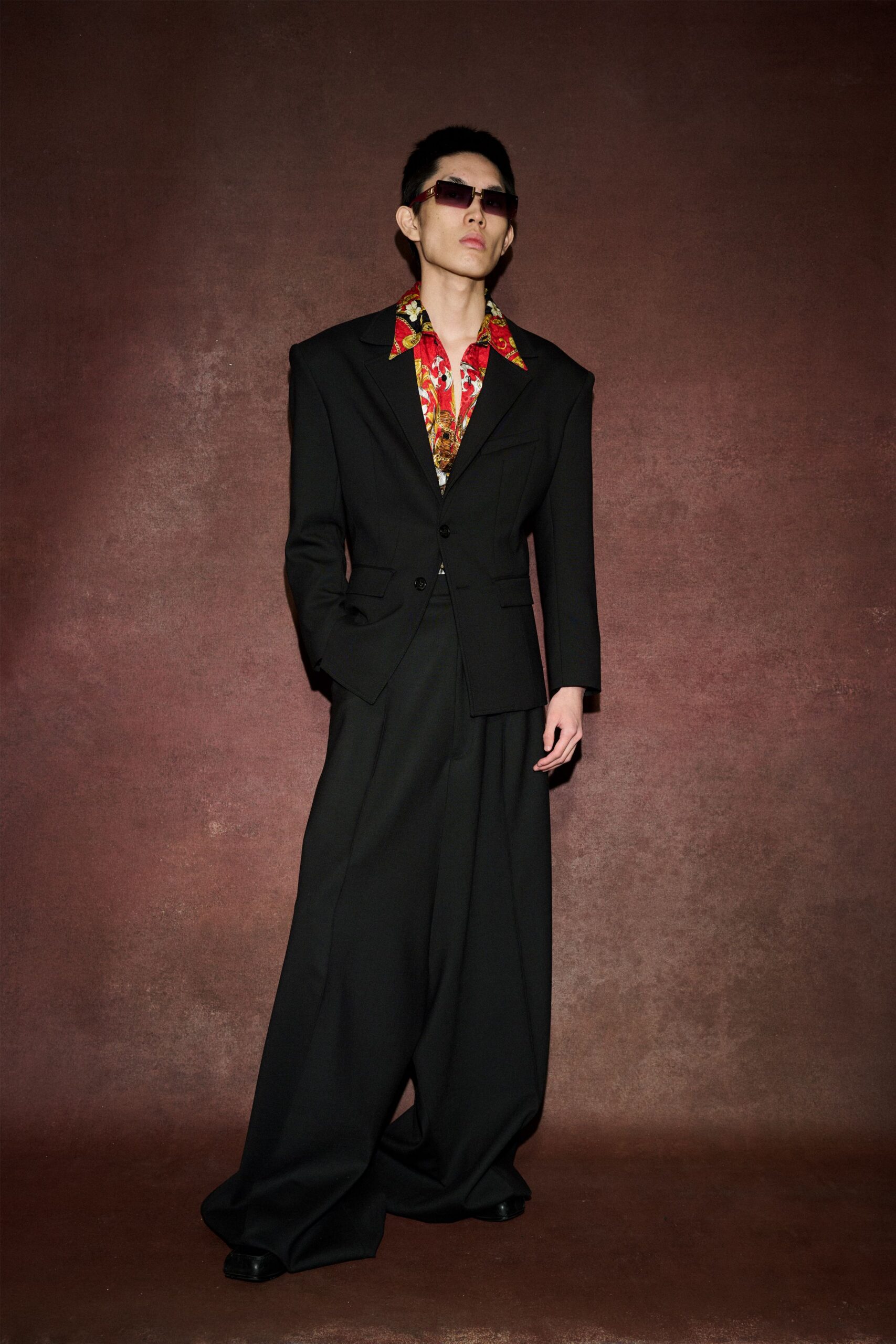 black relaxed suit with floral shirt