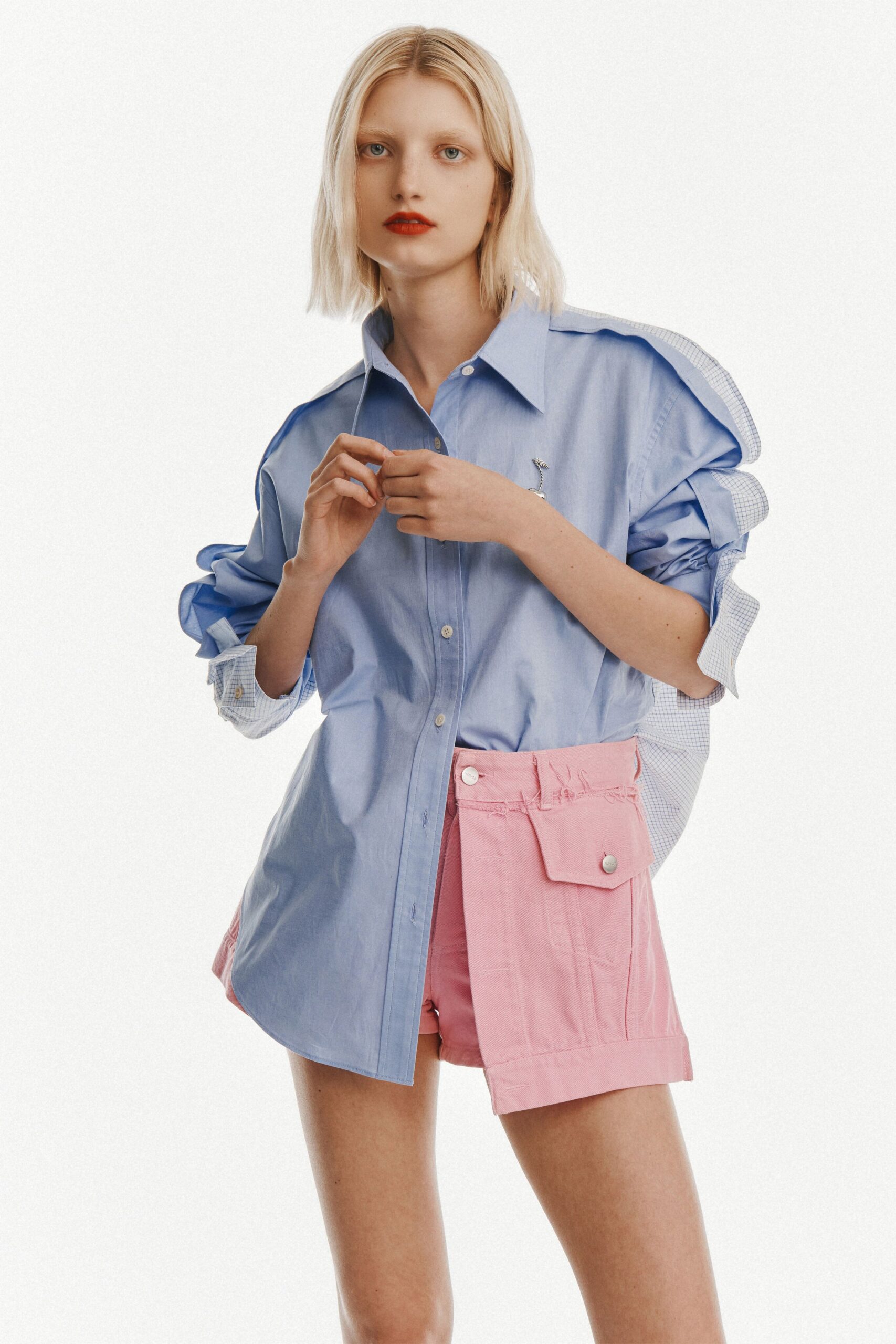 blue shirt and pink shorts