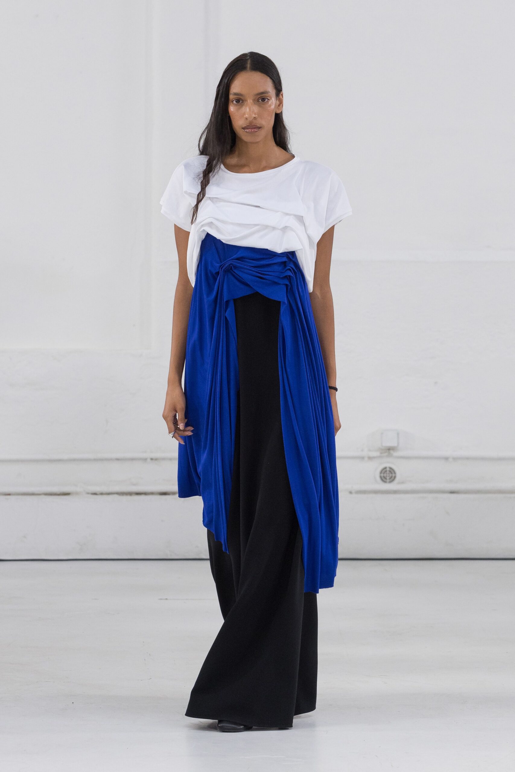 white top with black blue dress