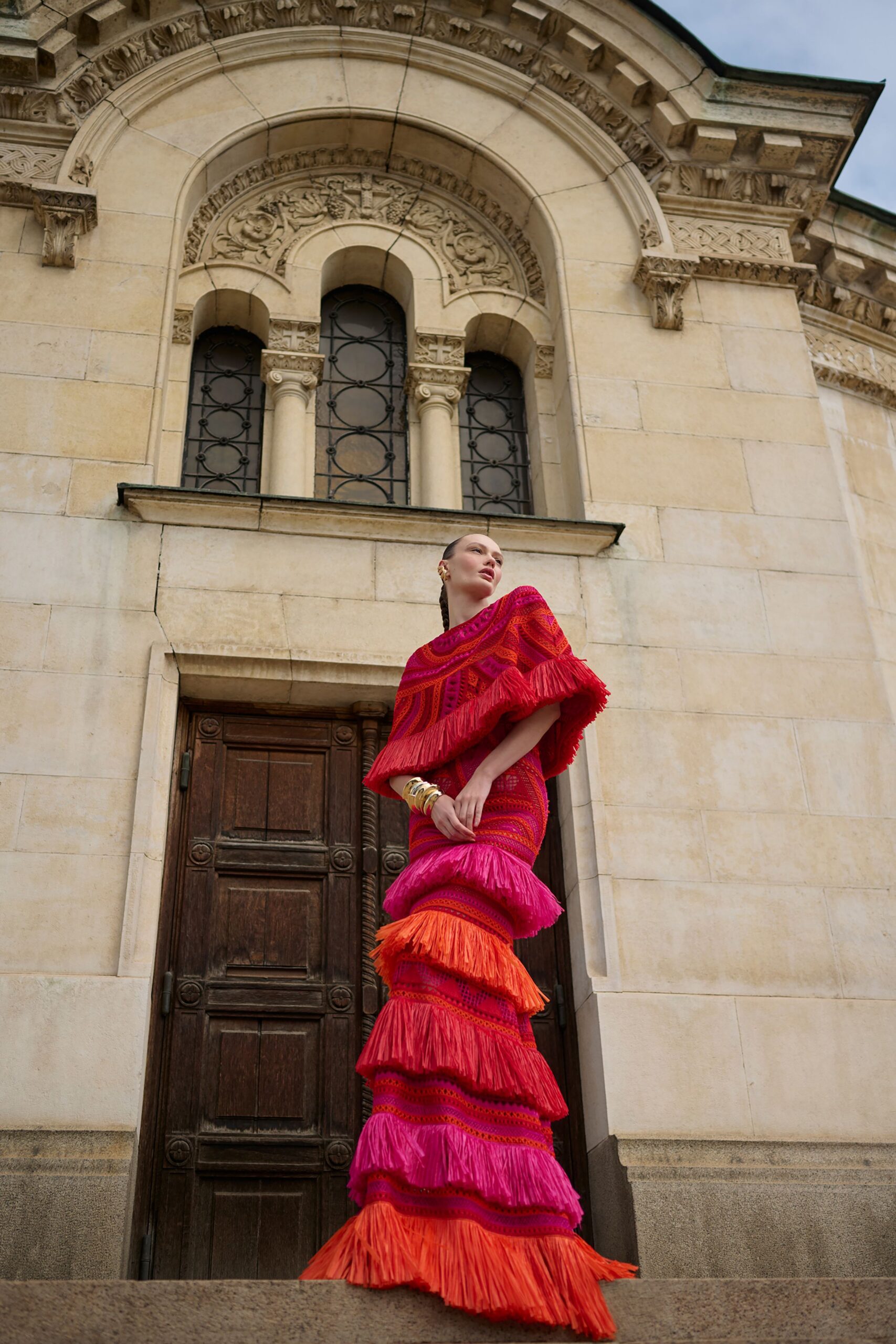 pink and orange fringed gown
