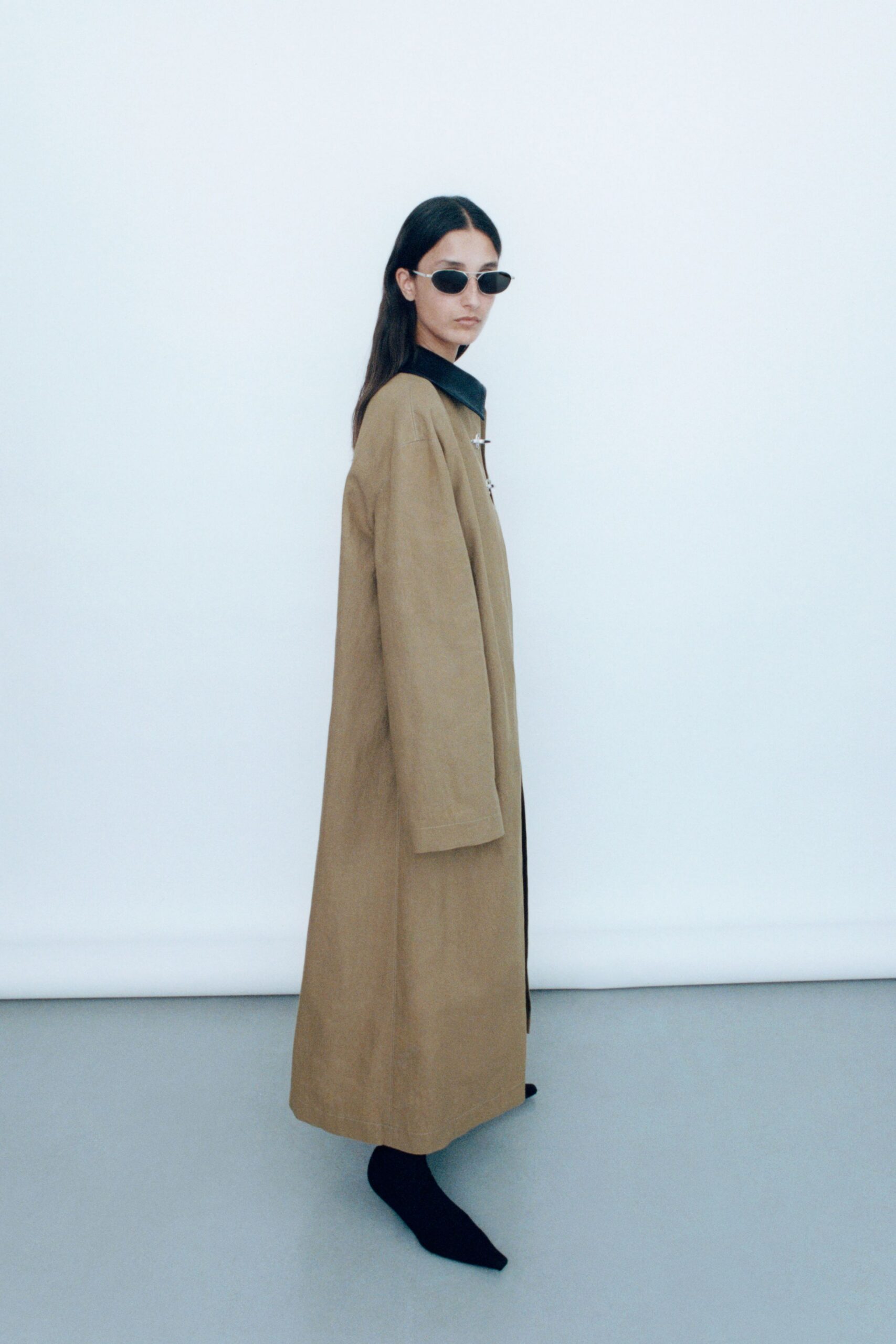 brown relaxed coat with sunglasses