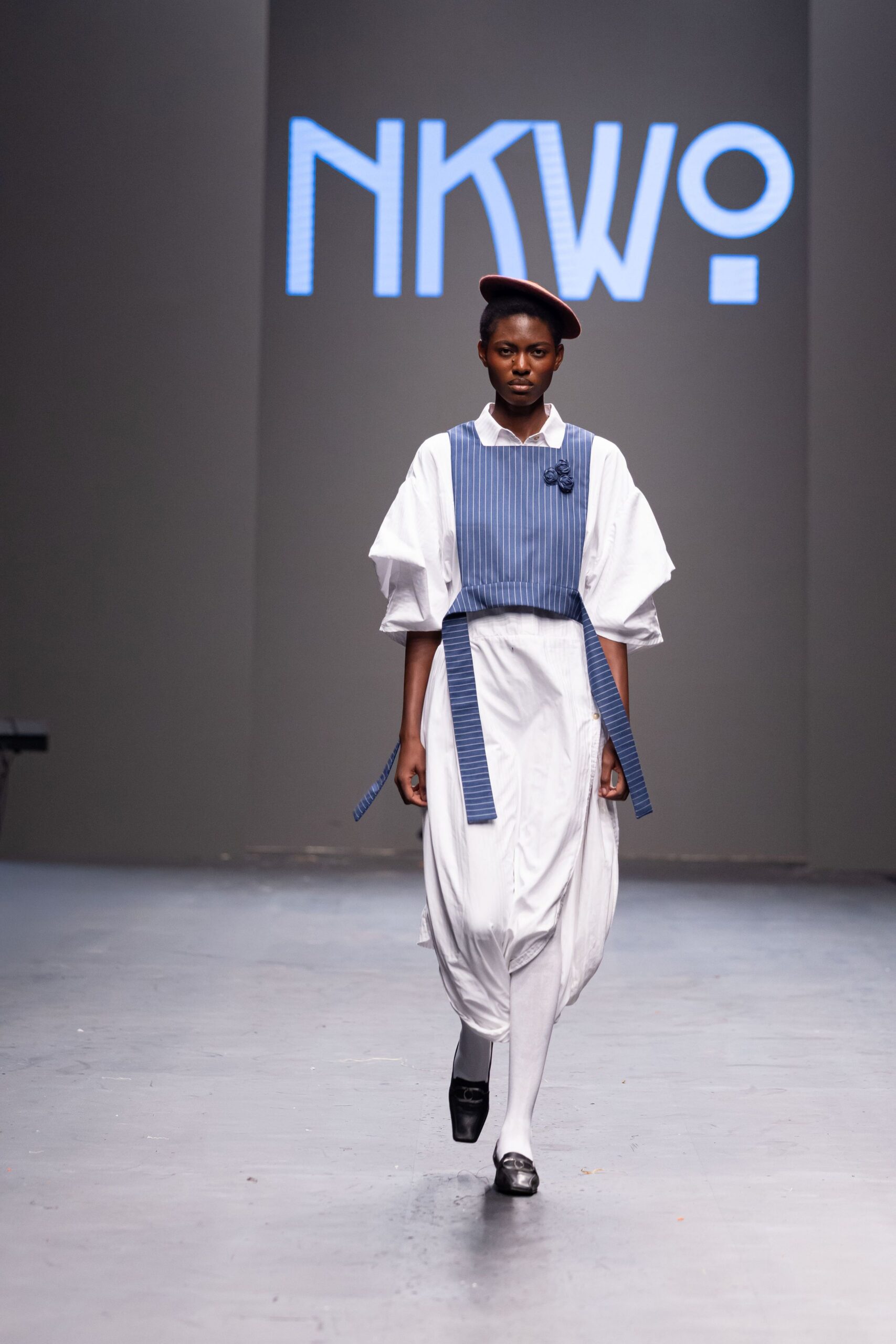 blue and white relaxed shirt with pleated pants