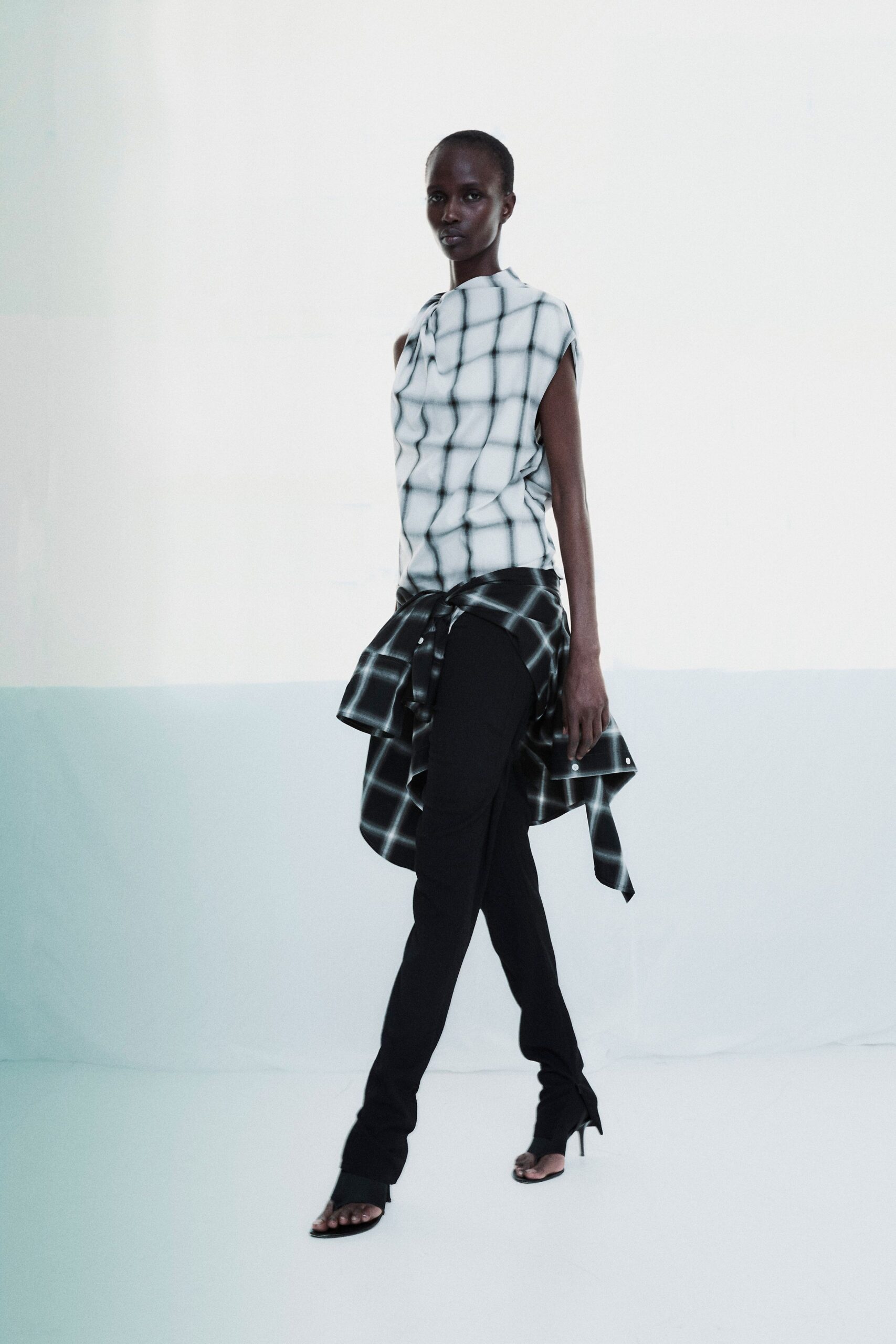 checked top with slim pants