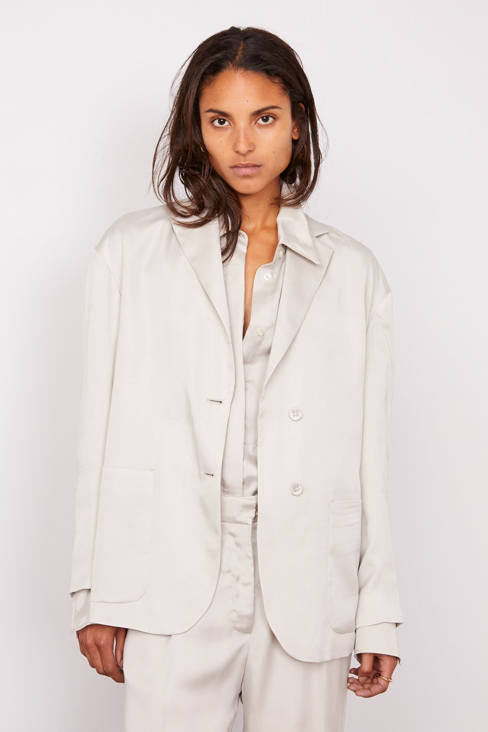 beige silk long-sleeve collared oversized buttoned blazer