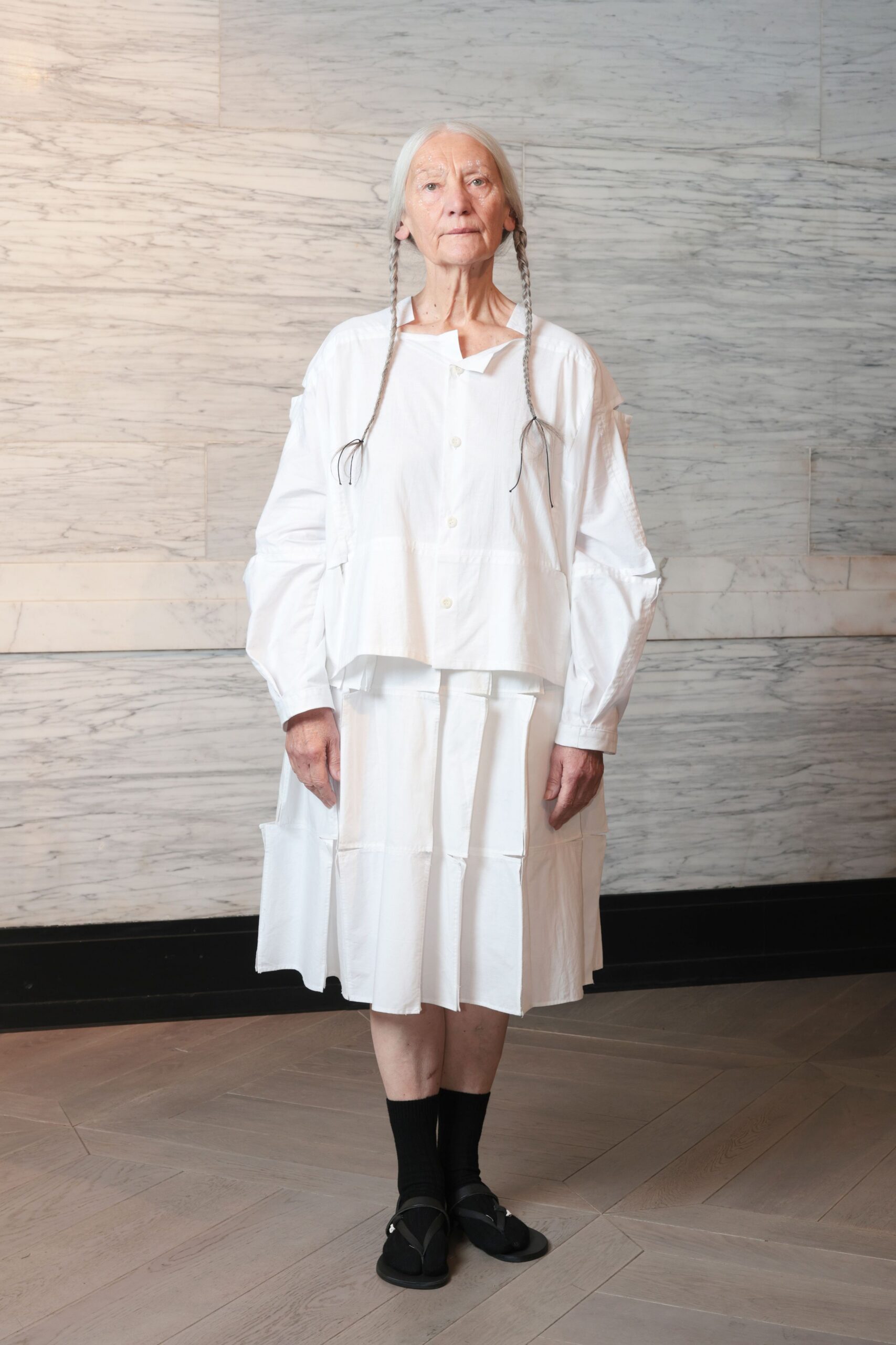 white relaxed midi dress with black shoes